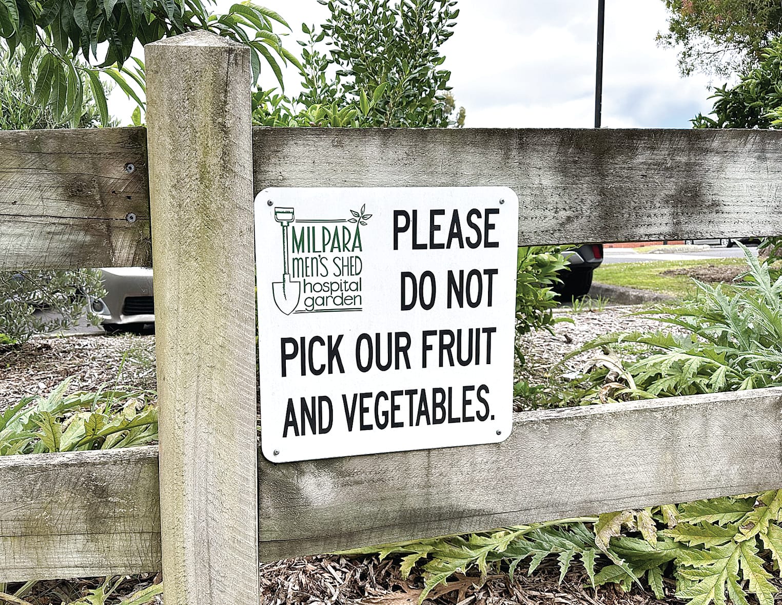 Signs ask people not to take food and vegetables from the garden which supplies Milpara Food Bank with fresh produce and casseroles. ob03_0324