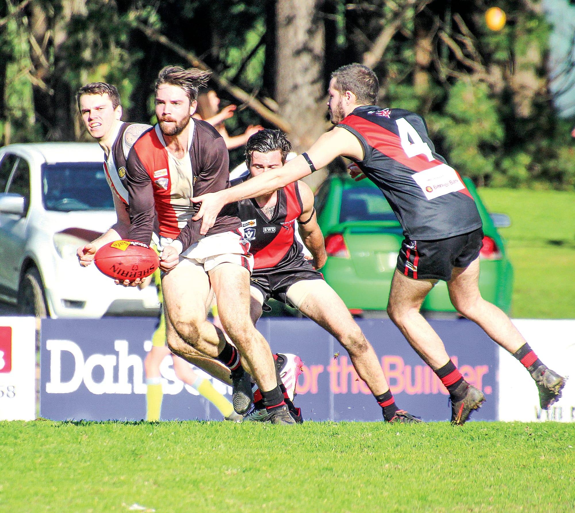 Dylan Heylen looks for an option amid the action.