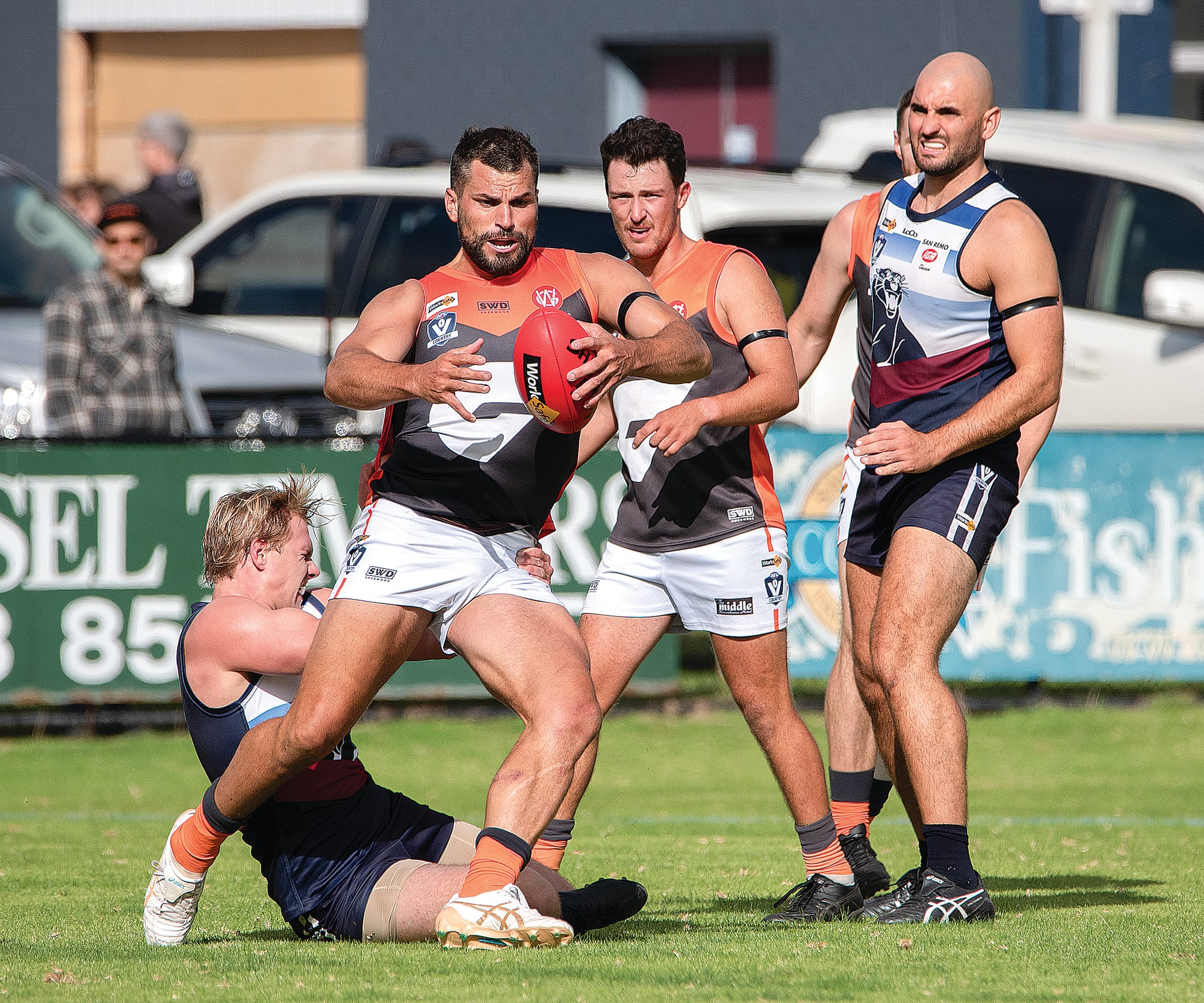The Giants’ Paul Fermanis fights off Kilcunda-Bass in Saturday’s header.