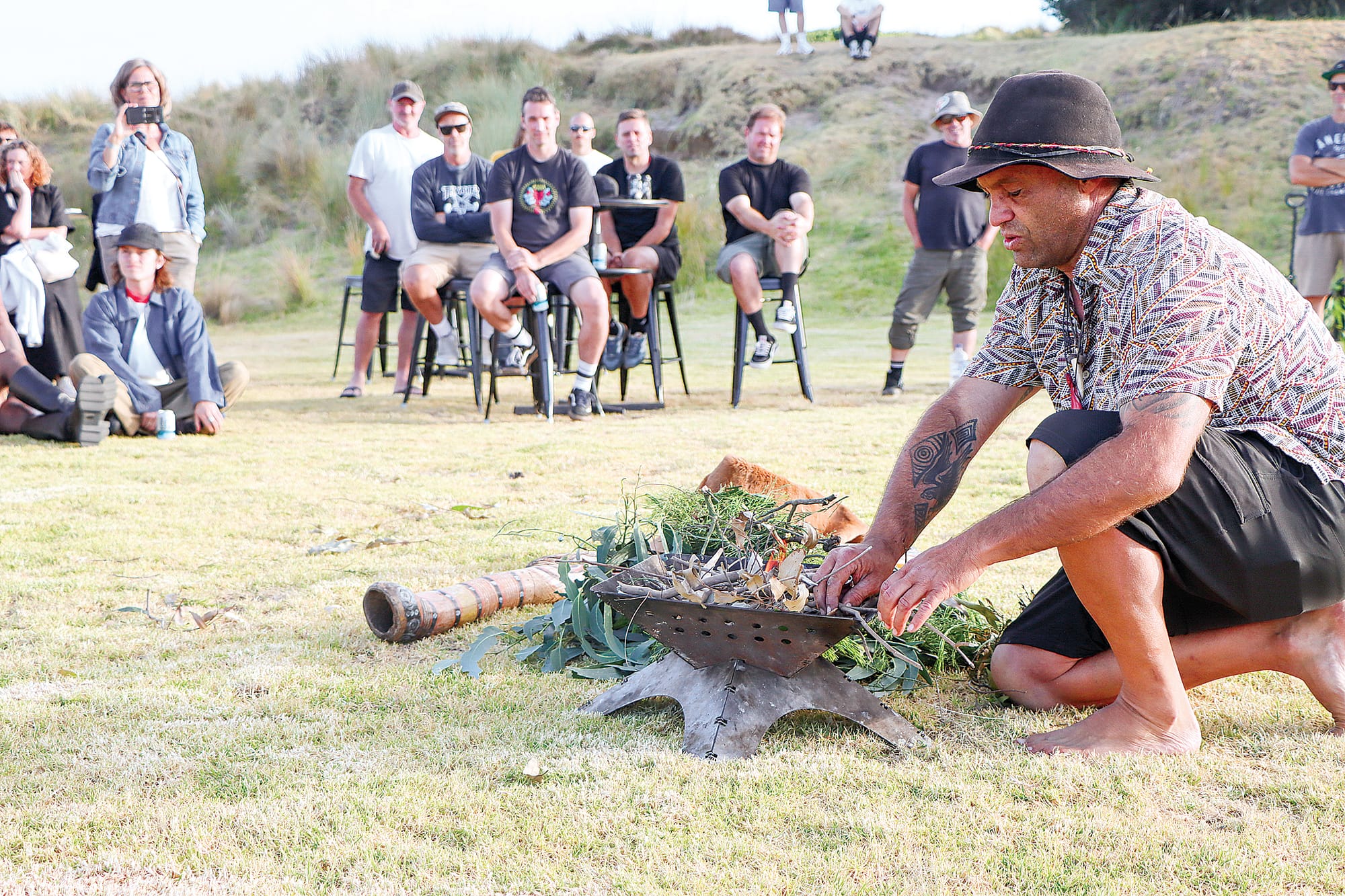 Steve Parker conducts a smoking ceremony prior to the Sapa film screening. A52_0924