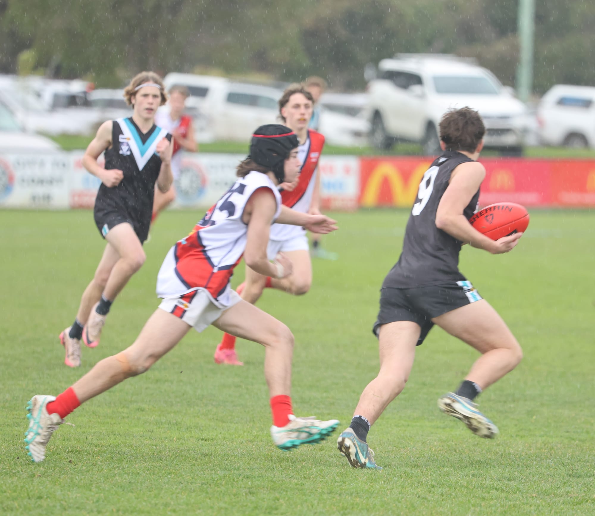 Wonthaggi’s Sam Carter gets into the clear as Power’s Under 16 team protects its lead late in the game.