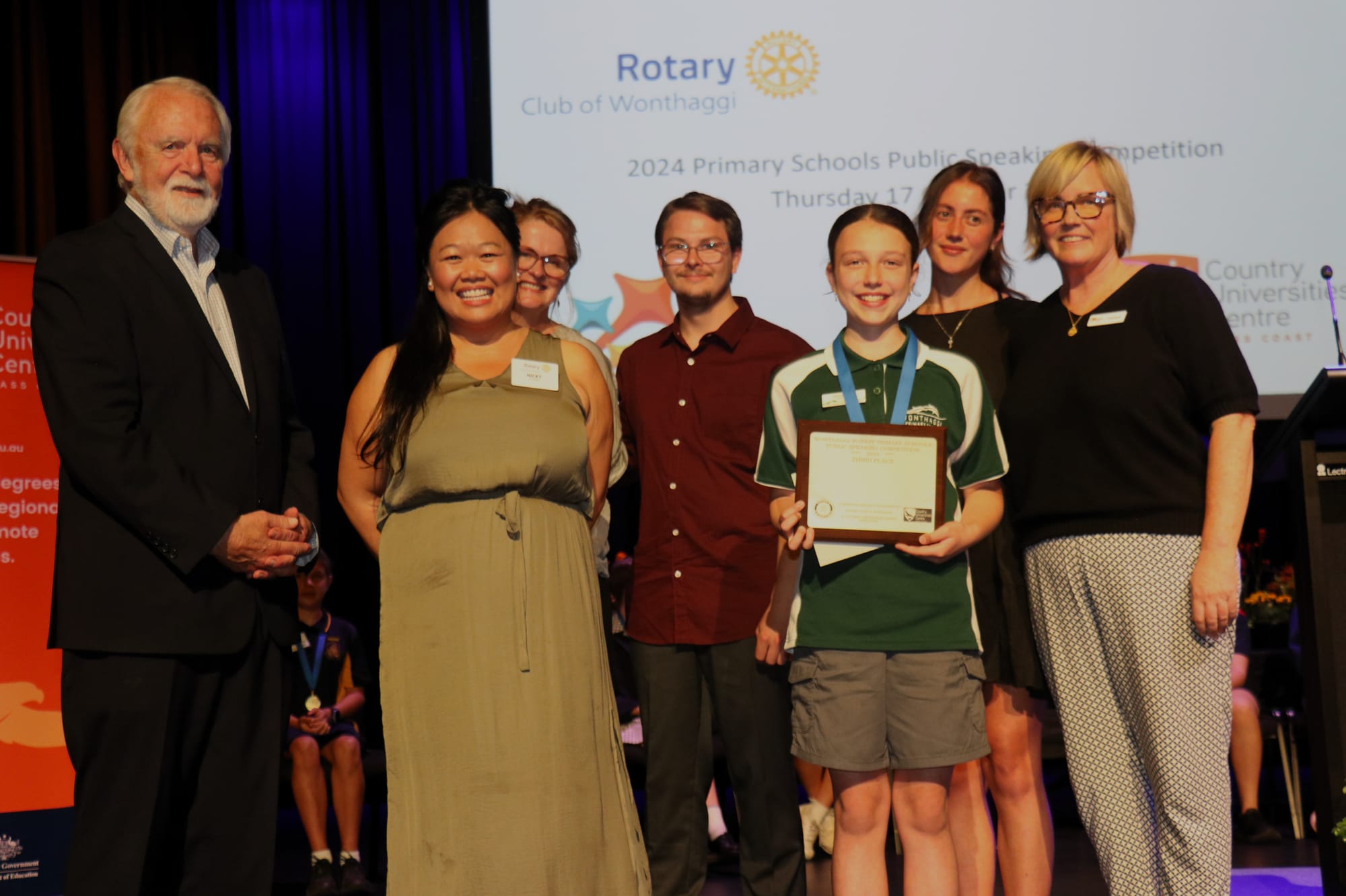 Don Paproth, Nicki Chung, Amanda Mc Mahon, Alex Charlton, Sophie Hogan, and Sarah Bourke congratulating Leila Andrews on third place at the 2024 Primary Schools Public Speaking Competition. 