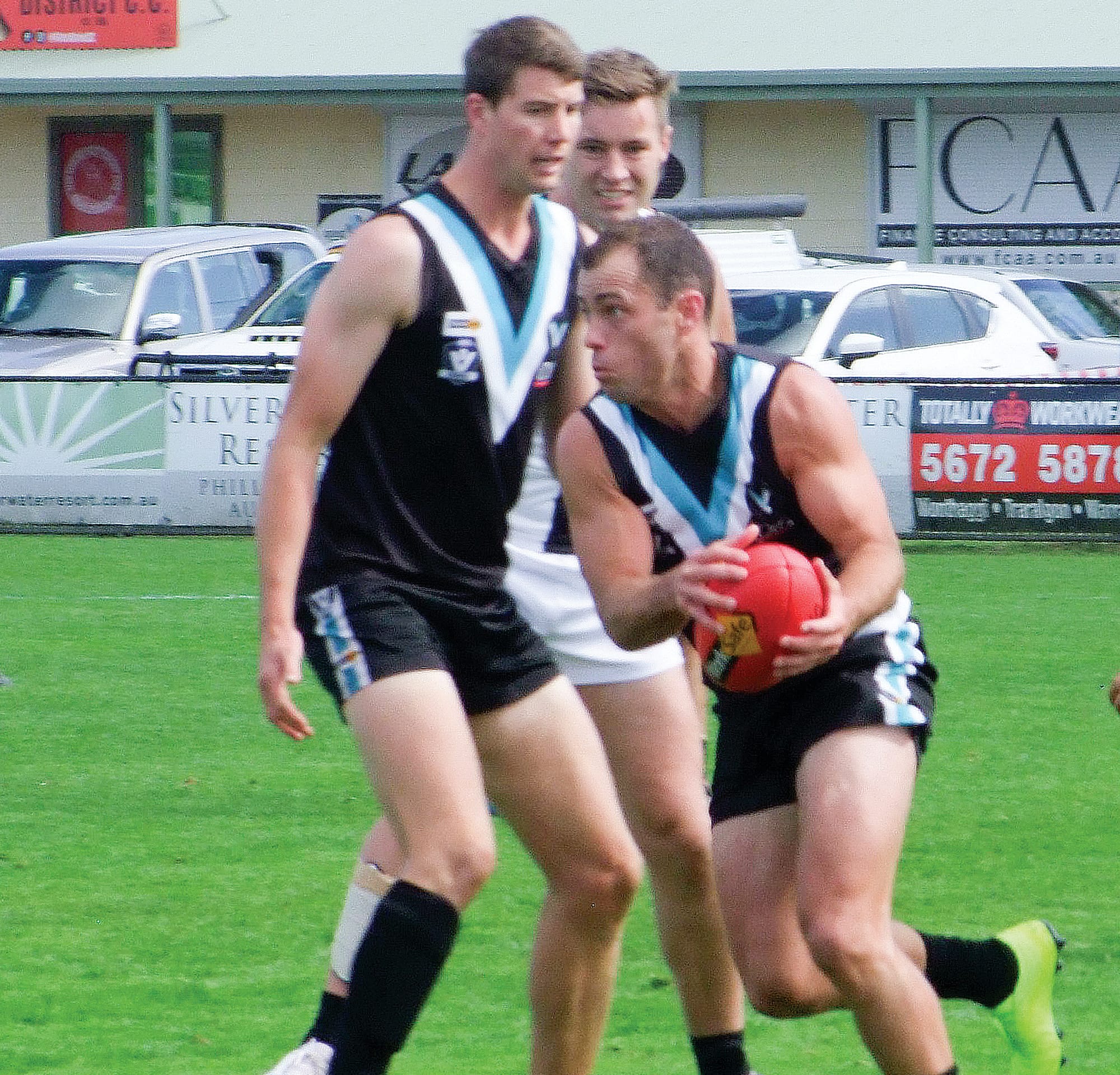 Wonthaggi Power captain Aiden Lindsay leads from the front in a typically inspiring game against the talented Sale midfield. Power. Photos: Paul Landells