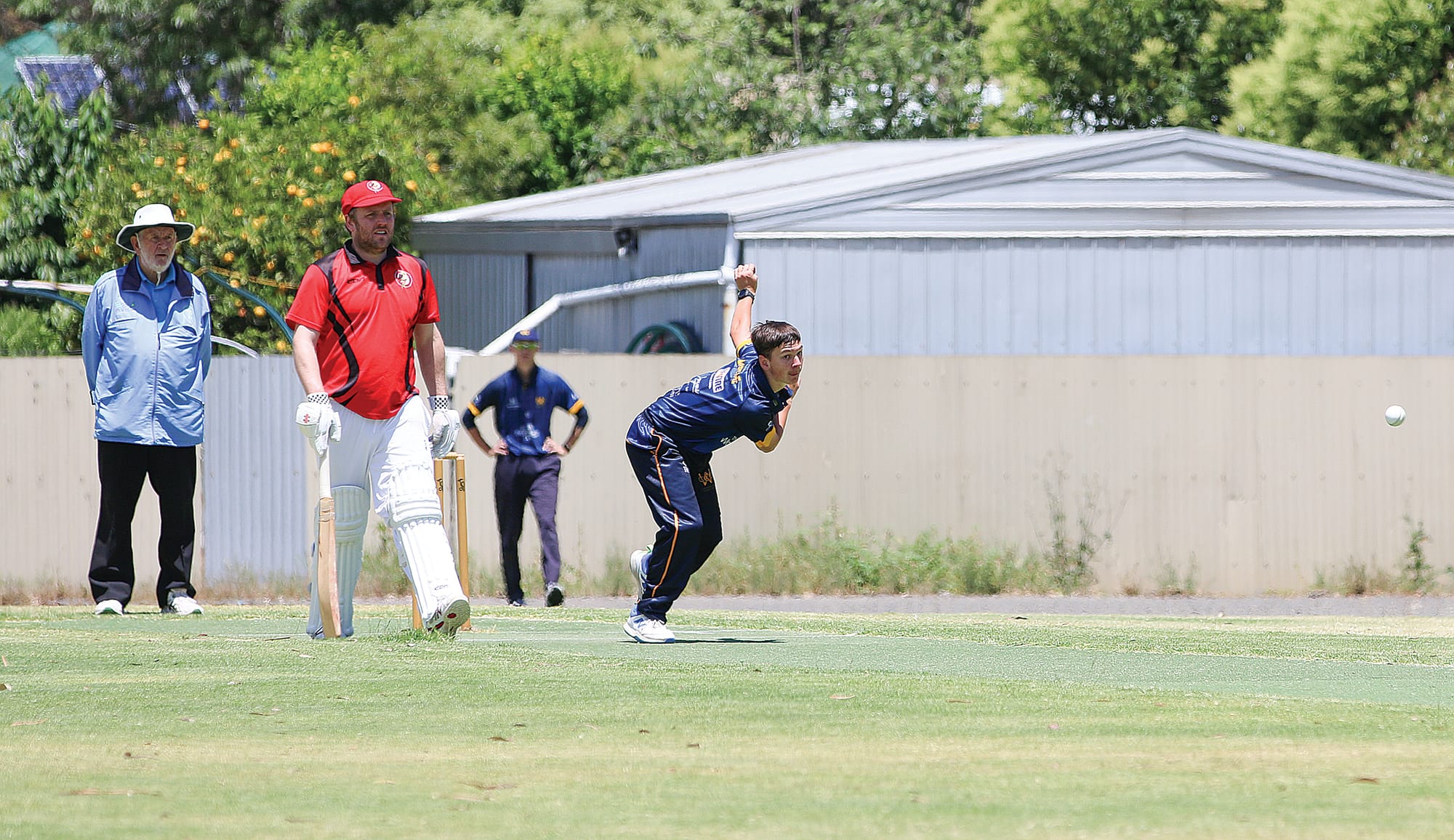 Wonthaggi Club’s Lucas McRae sends one down to the formidable Damien Symmons.