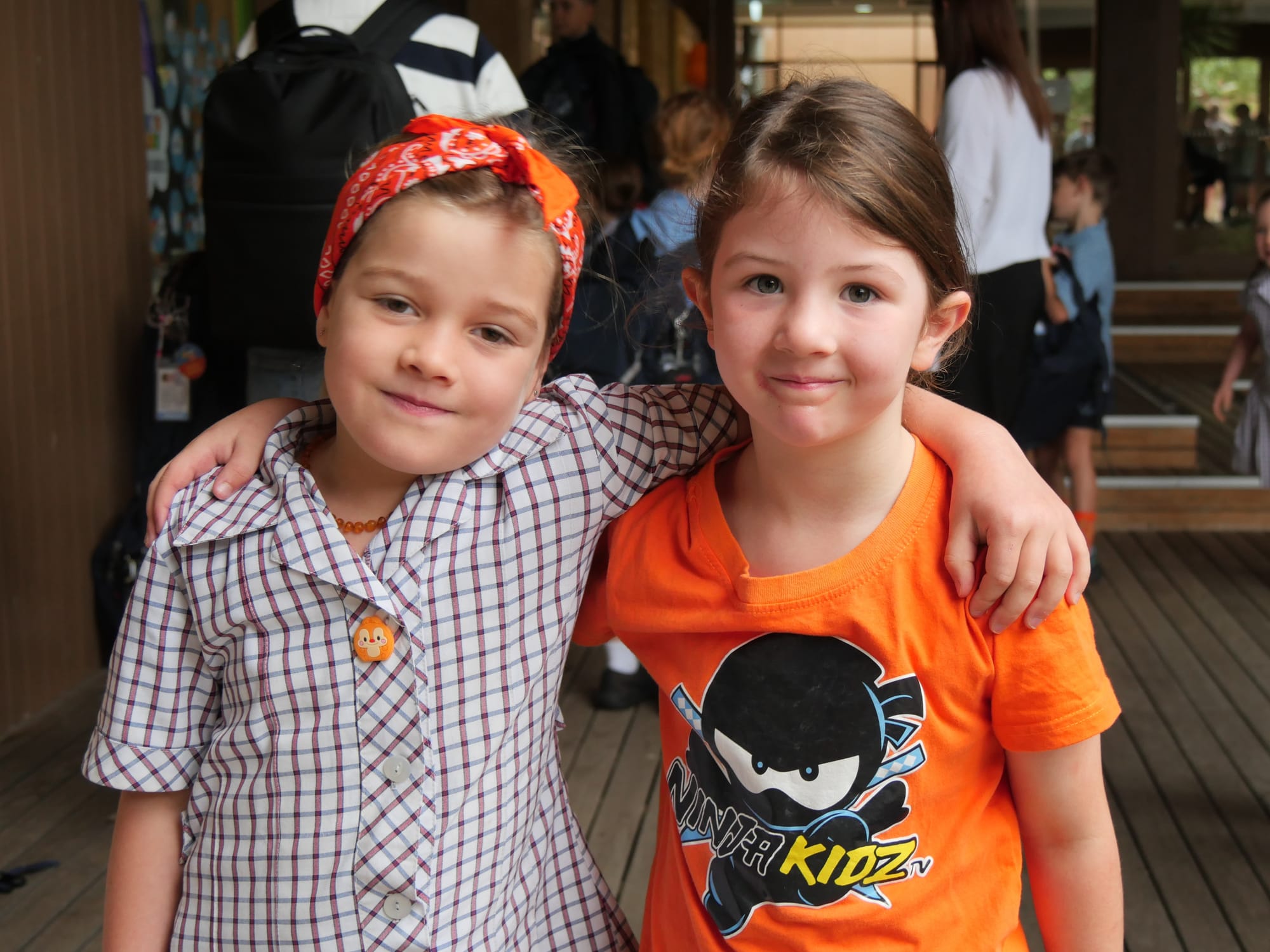 Newhaven College Prep students Kya Tomaselli and Sophie Schellekens wore a ‘splash of orange’ for International Harmony Day on Friday.