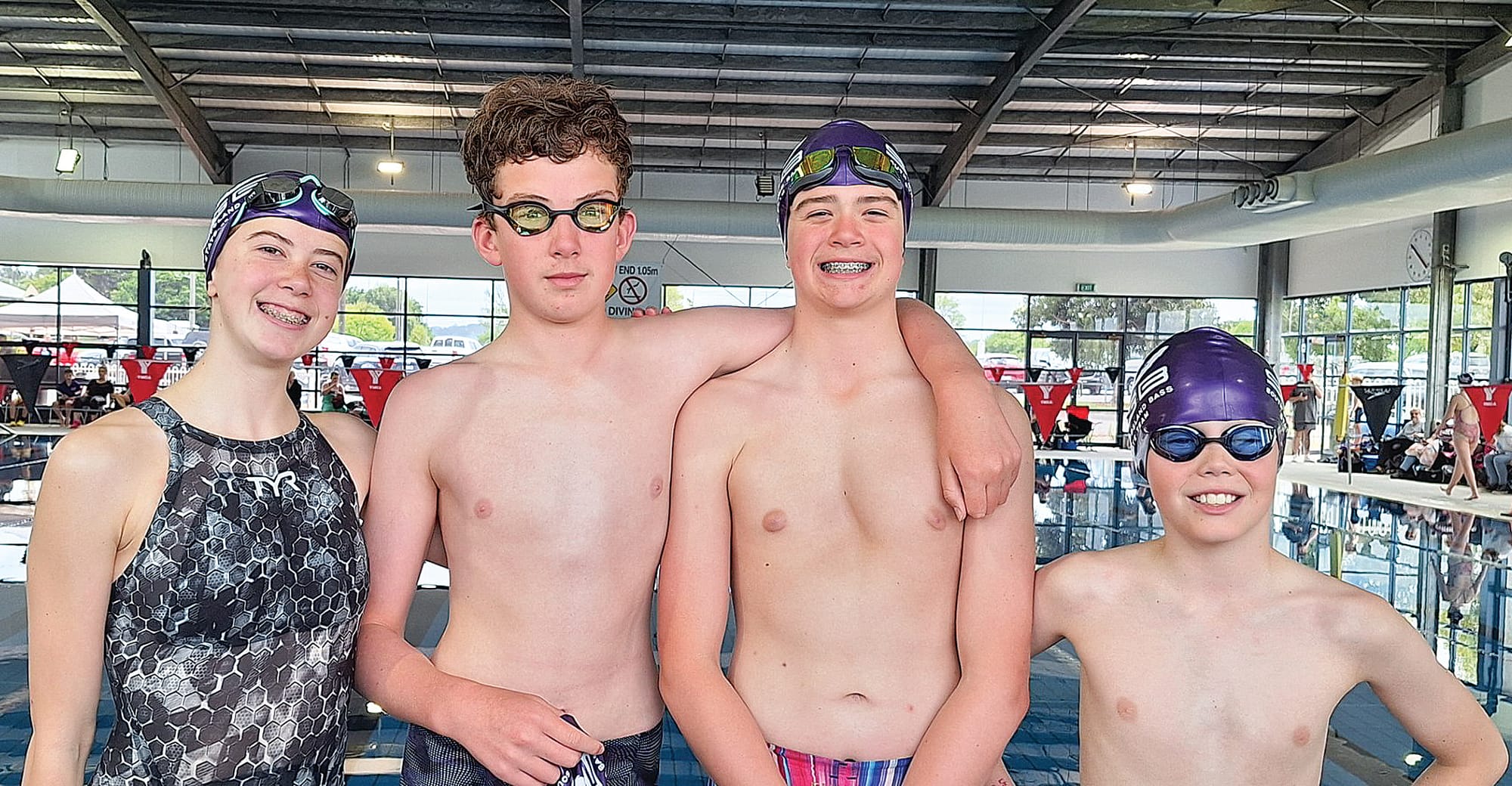 Archie and Aidan get ready to compete against siblings Lara and Darby in the relay.