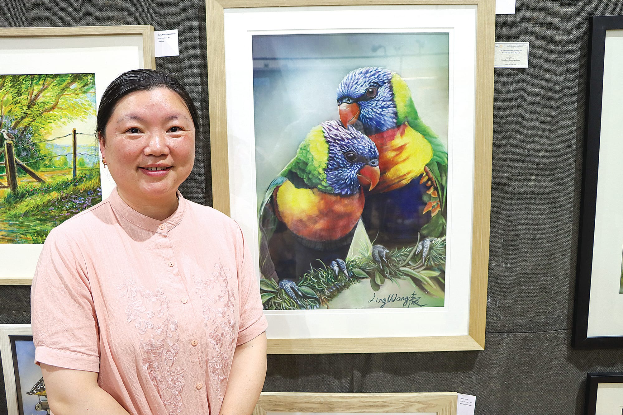 Ling Wang with her magnificent pastel work ‘Rainbow Companions’. A12_0325
