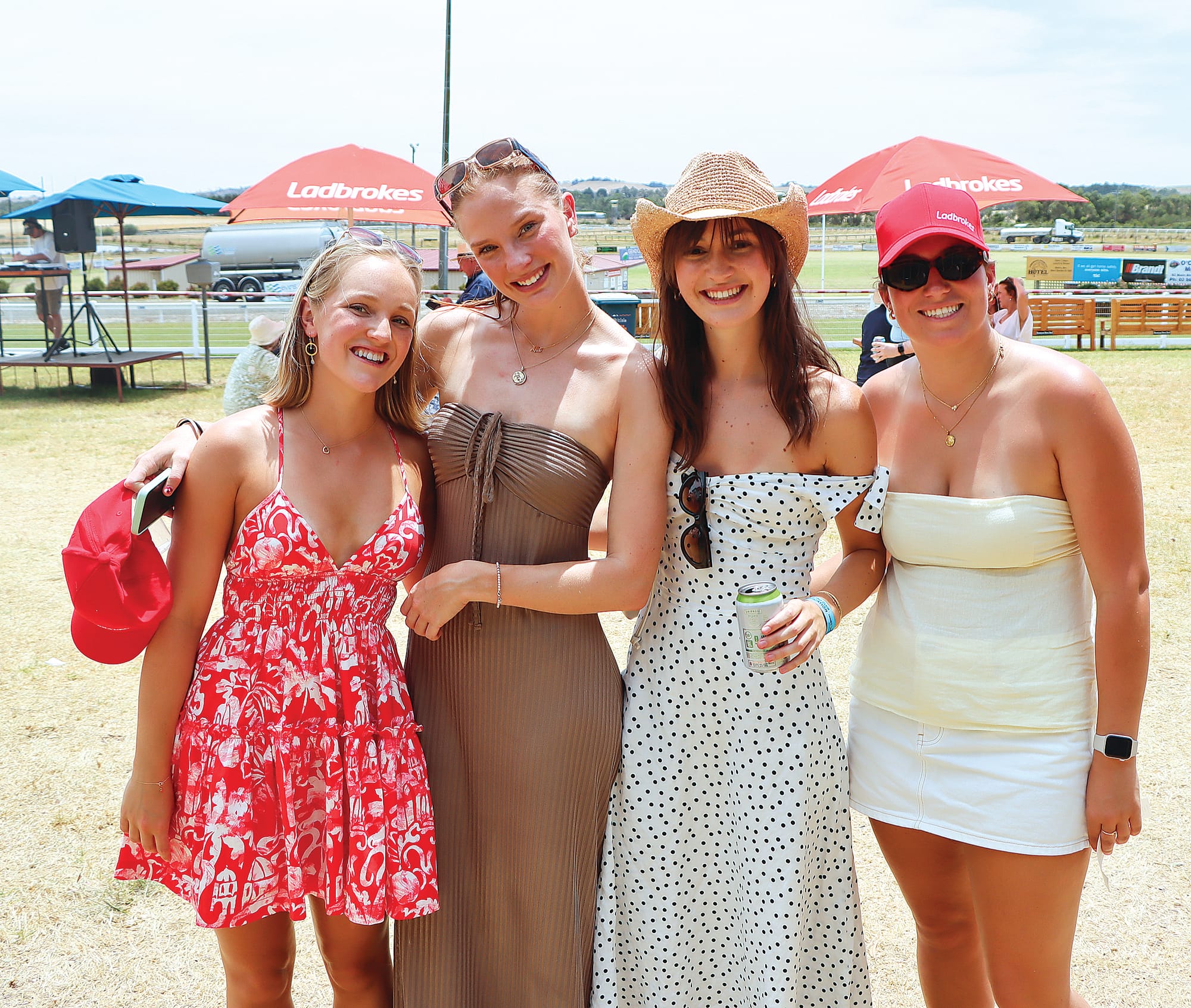 Casey Conlan, Mia Maguire, Sophie Norman and Chloe Fox enjoy a day at Stony Creek Racecourse while staying at Sandy Point. A64_0125