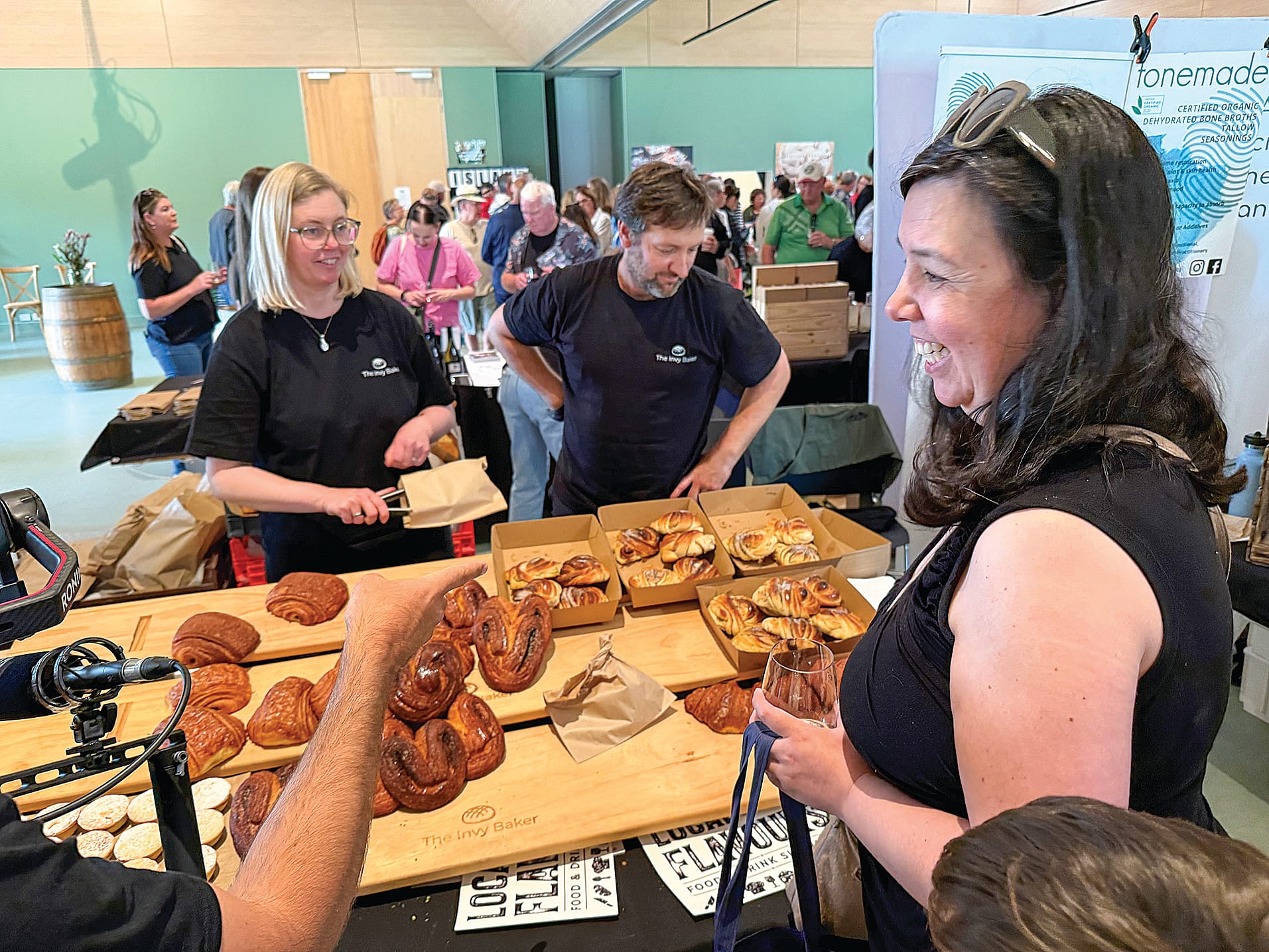 The Invy Baker Grego Montalban Sanchez and Hanna Lofgren with customer Suzanne Charlton at the Local Flavours Food and Drink Showcase at Berninneit last Sunday.
