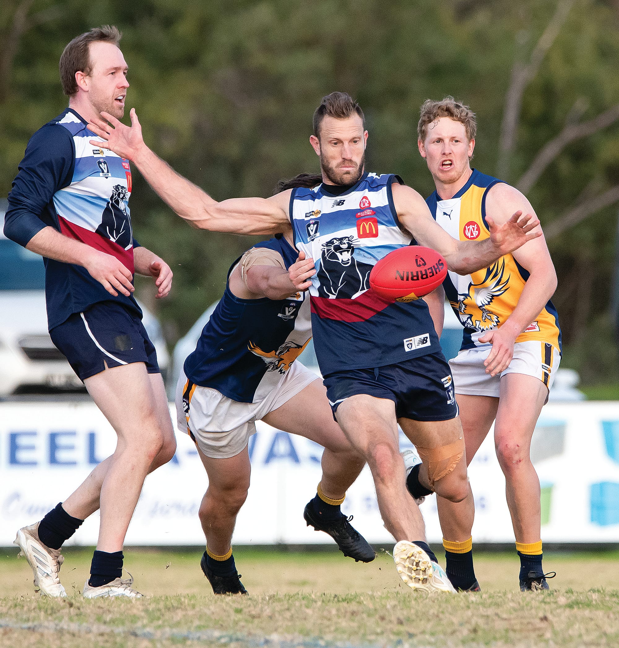 Travis Tuck sends the ball forward for the Panthers.