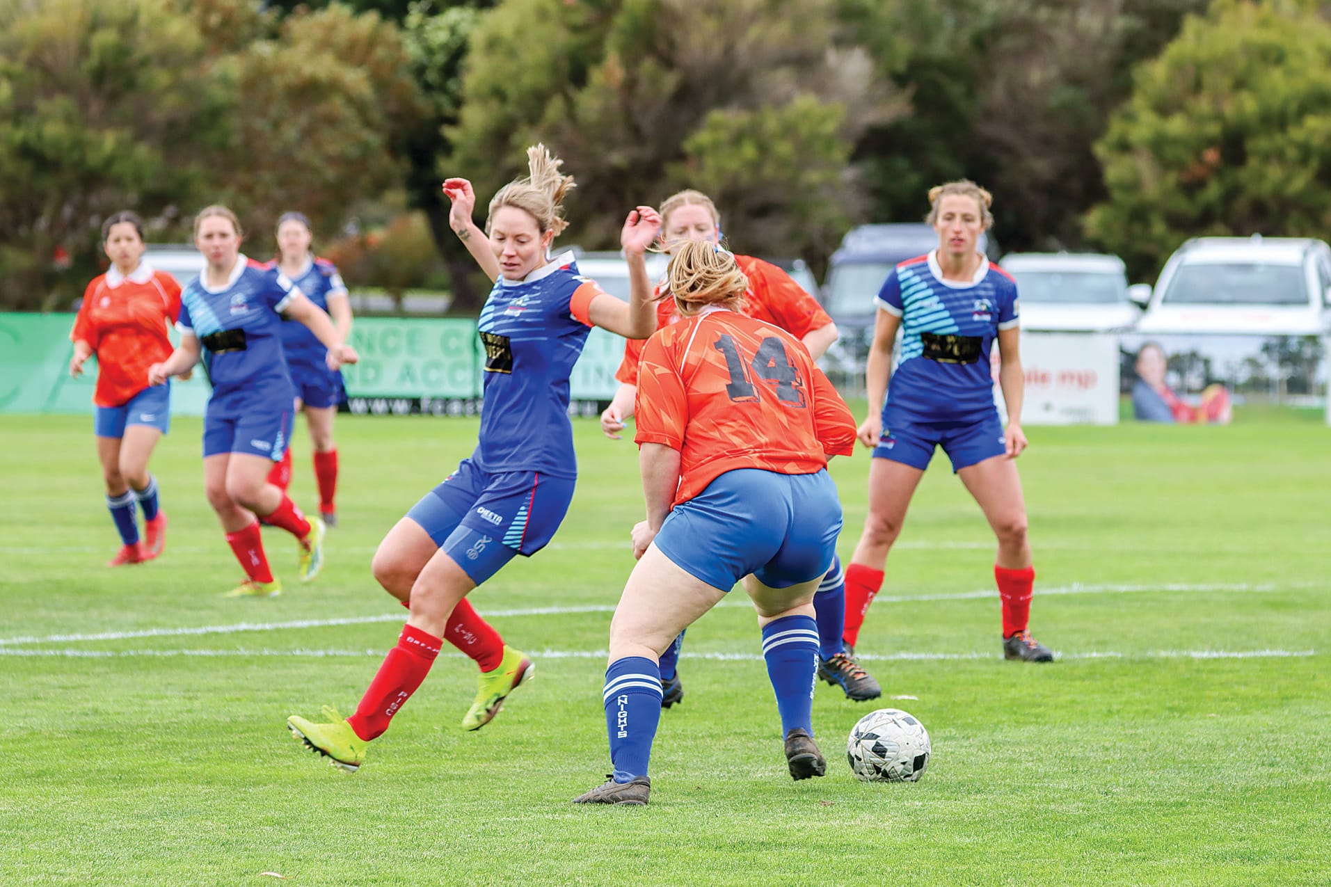 Phillip Island captain Kelly Wall tries to change course to catch Molly Gurnett of Leongatha. A64_3825