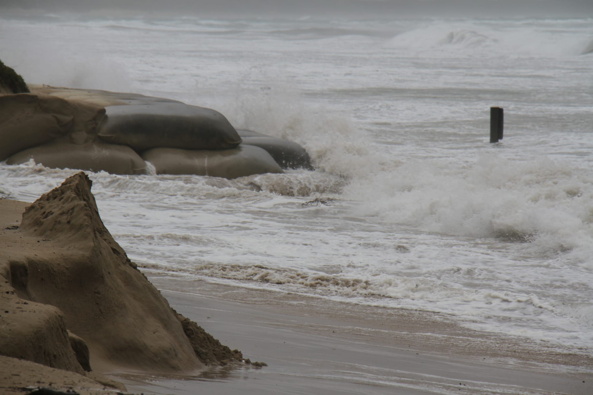 Little remains of sand placed at the Inverloch surf beach to protect the Inverloch SLSC.