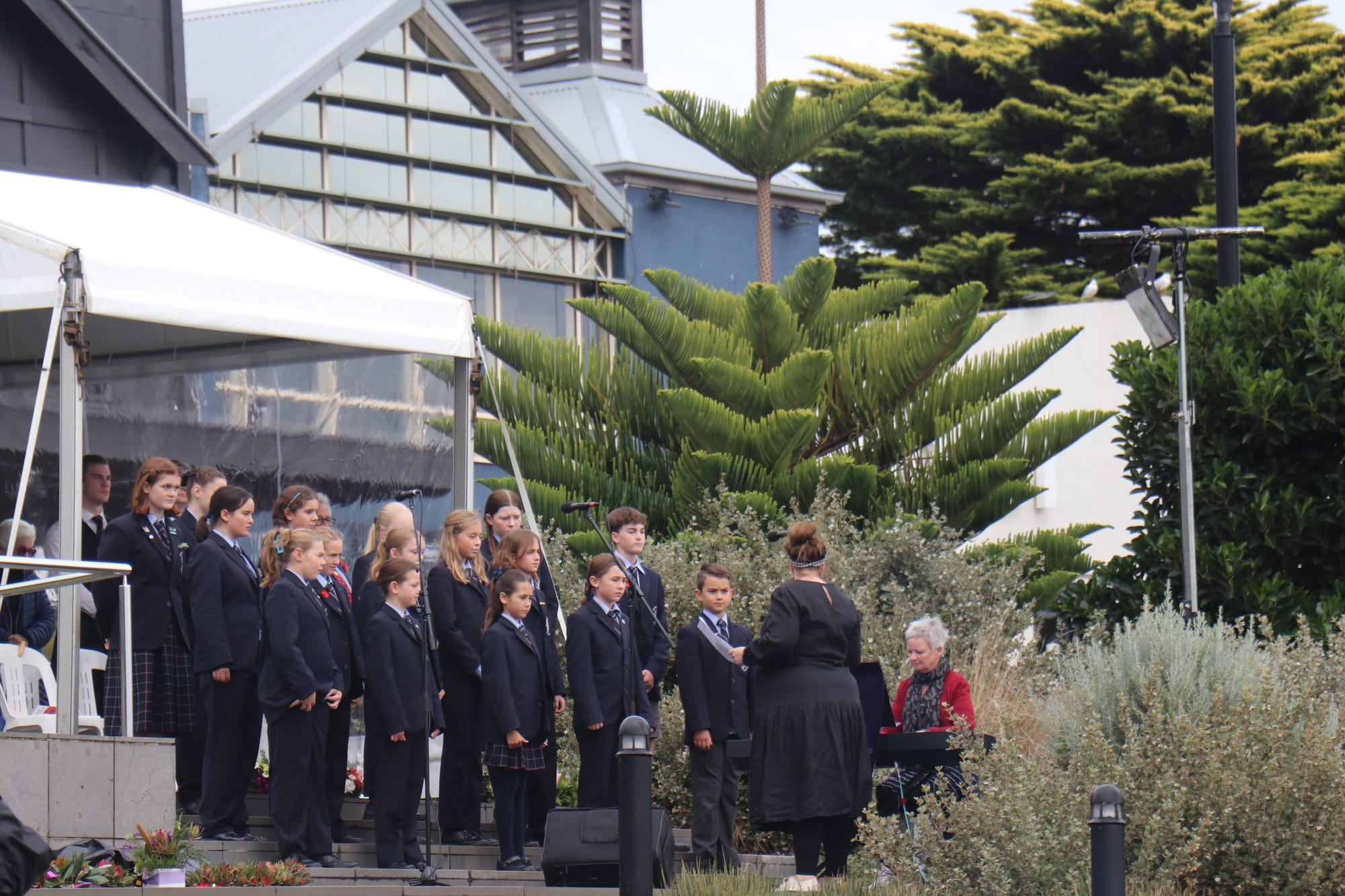 Newhaven College middle school choir singing the New Zealand and Australian National Anthem led by Elly Poletti, with Carmel Slater on piano.