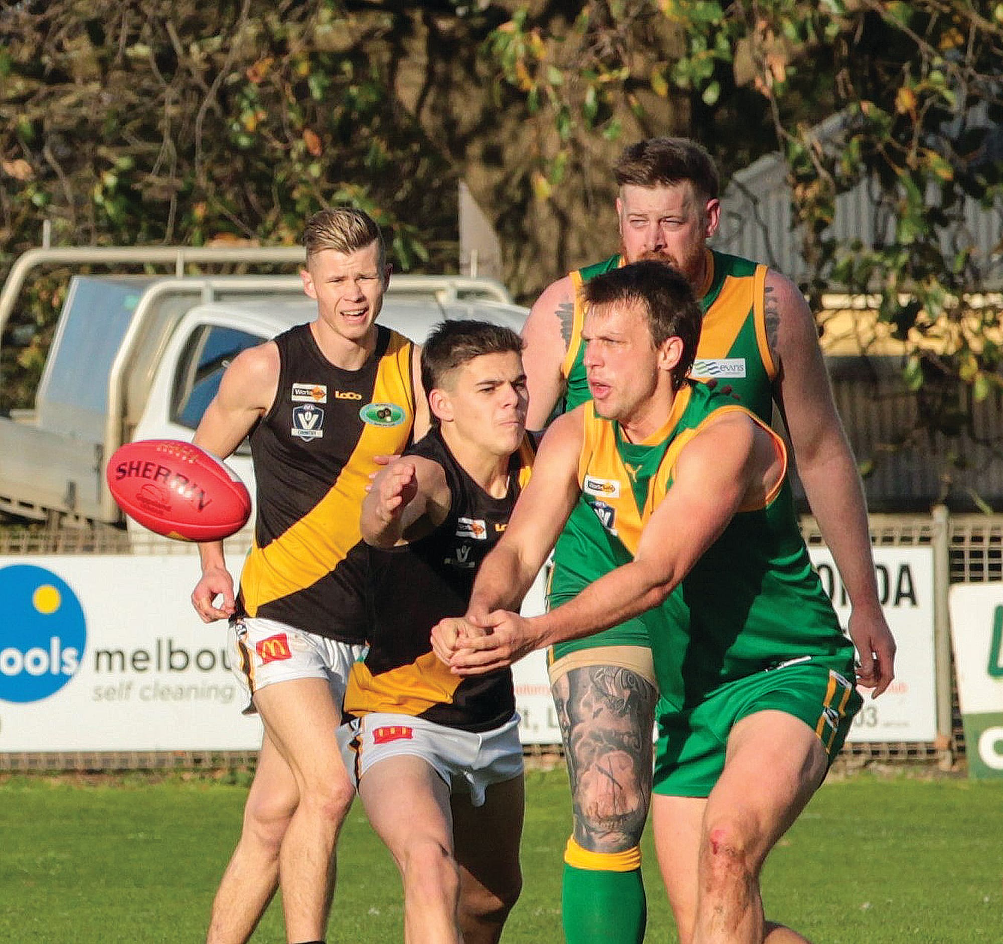 Sean Westaway handballs clear of the pack.