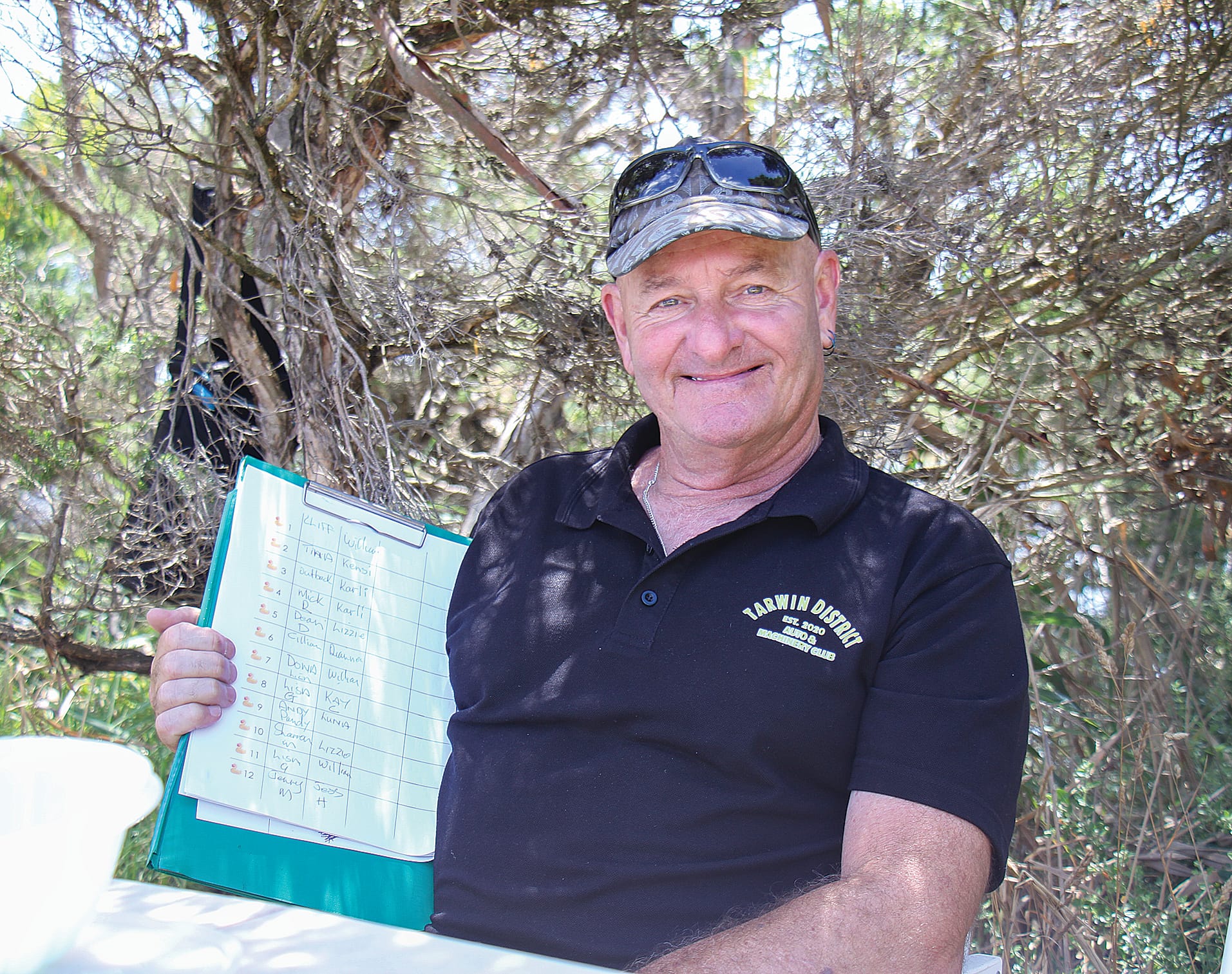 Shane Nelson taking tickets for the duck derby at Tarwin Lower. B31_0425