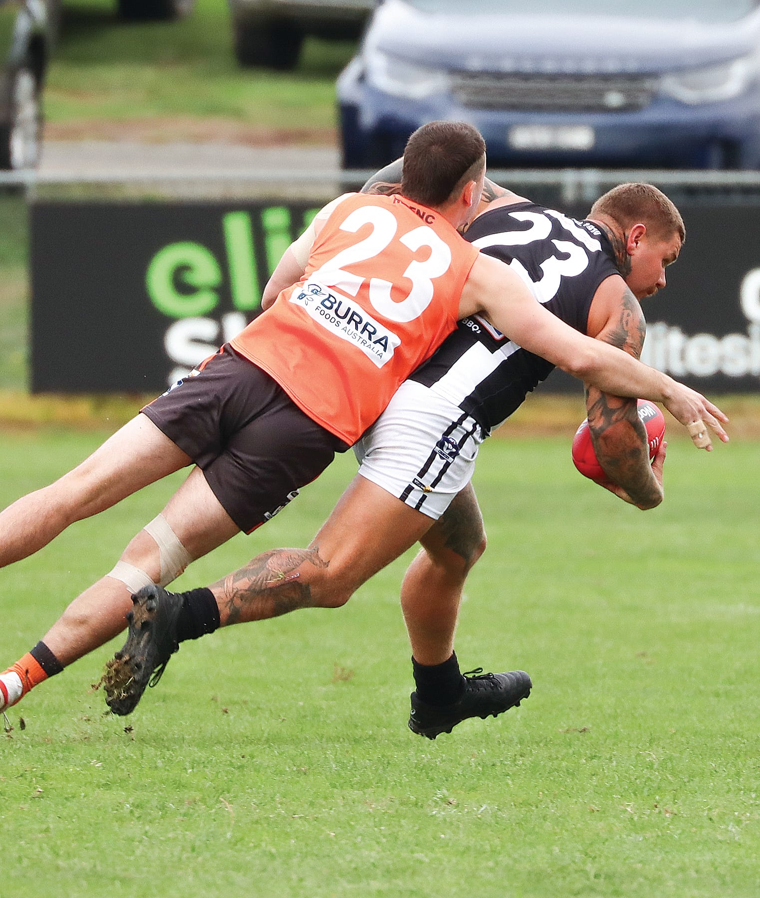 Korumburra-Bena’s Kye Benson applies pressure to Dalyston’s Brad Tilley in the battle of the 23s. A28_1725