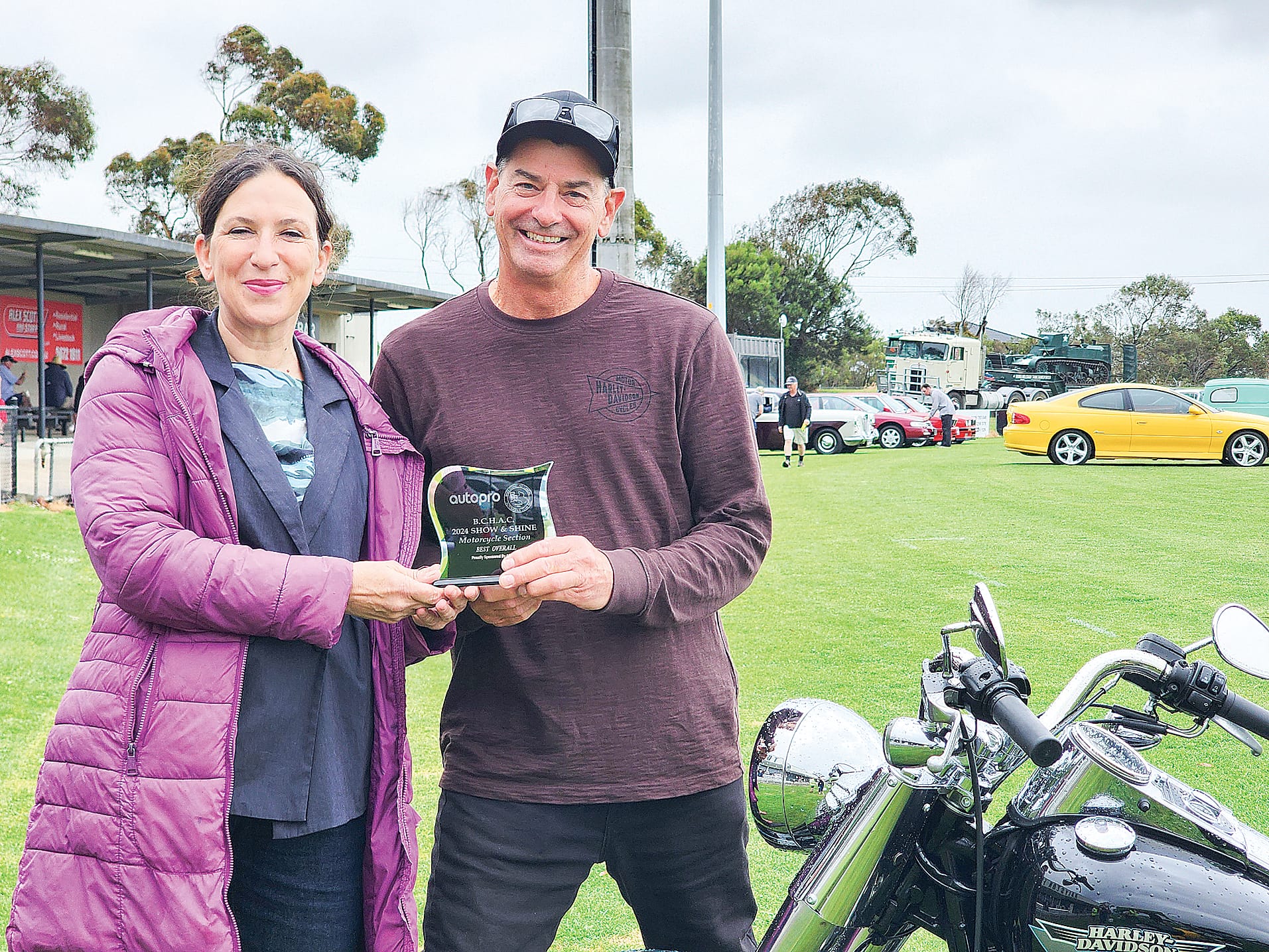 Local Roger Pendlebury with Member for Bass Jordan Crugnale won the Best Overall Motorcycle with his Harley Davidson Fat Boy 2010. C15_4724