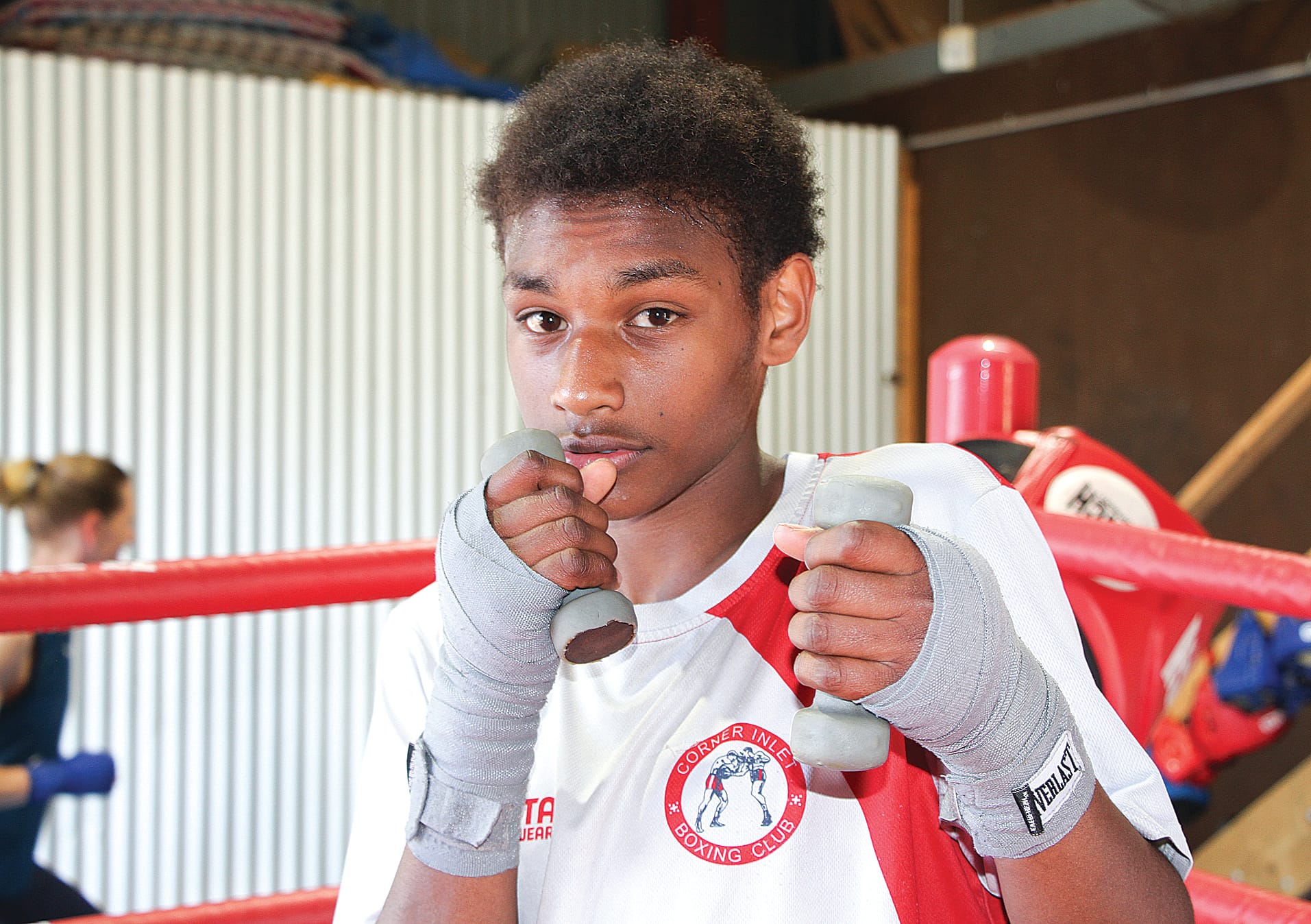 Asha Olden gloves up ahead of the Corner Inlet Boxing Club annual boxing tournament. B02_4524