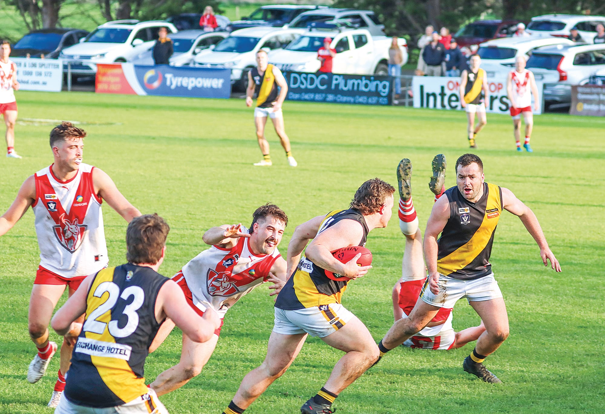 Foster’s Harley Hoppner has the footy late in the decider, with Fish Creek still applying pressure. A32_3725