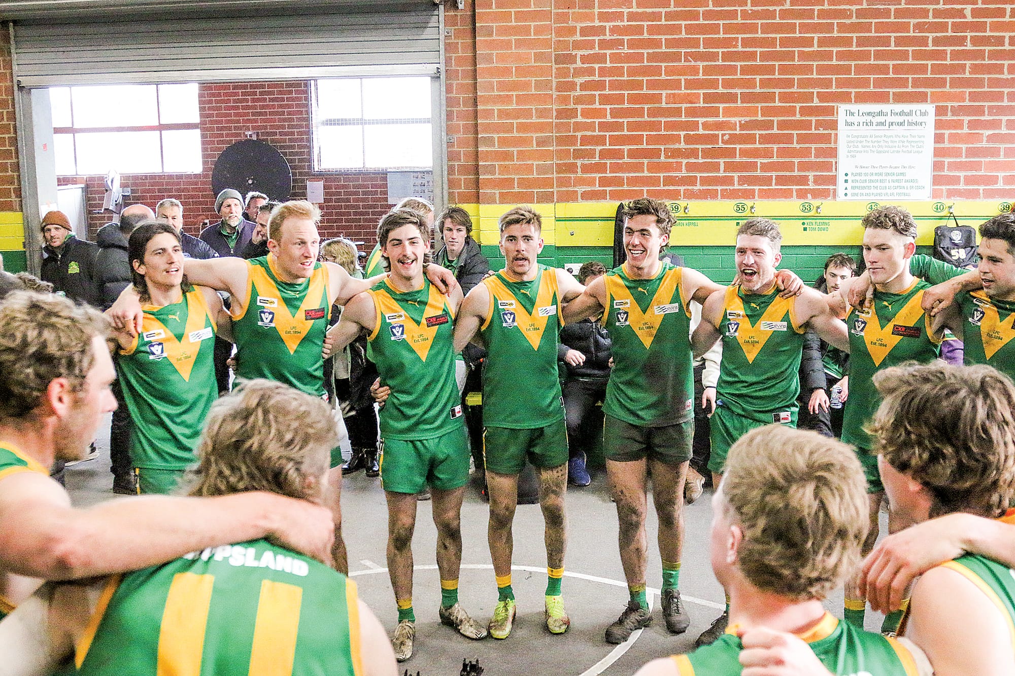 Leongatha players celebrate their unbeaten home and away season. A06_3422