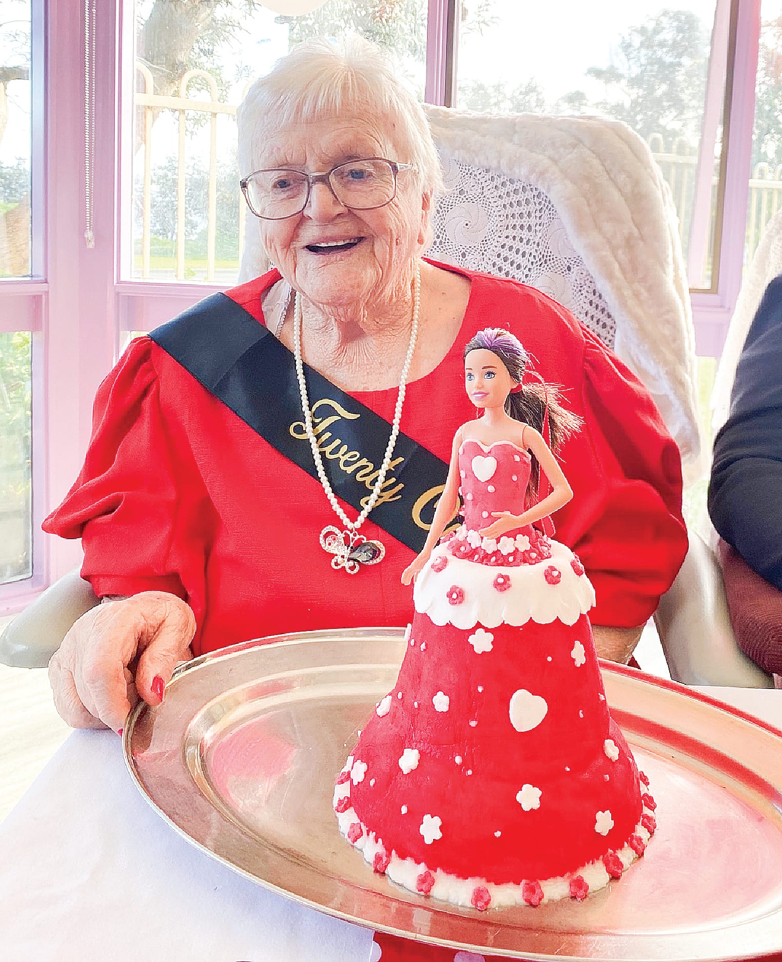 Ruth Andrews celebrates a belated 21st birthday complete with a doll cake as part of The Bucket List initiative at Bass Coast Health.