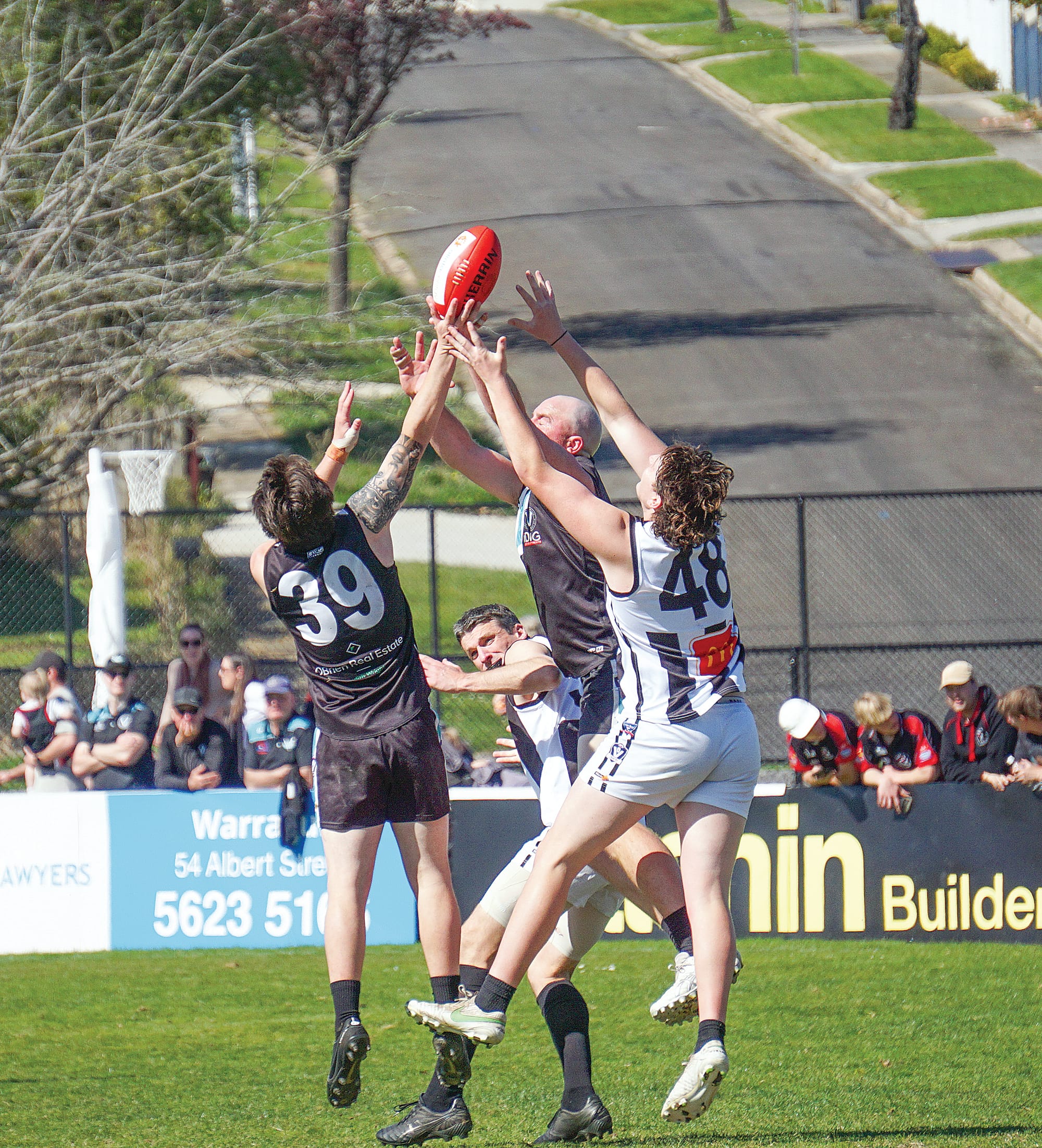 Reeve Moresco (39) gets the better of the ruck.