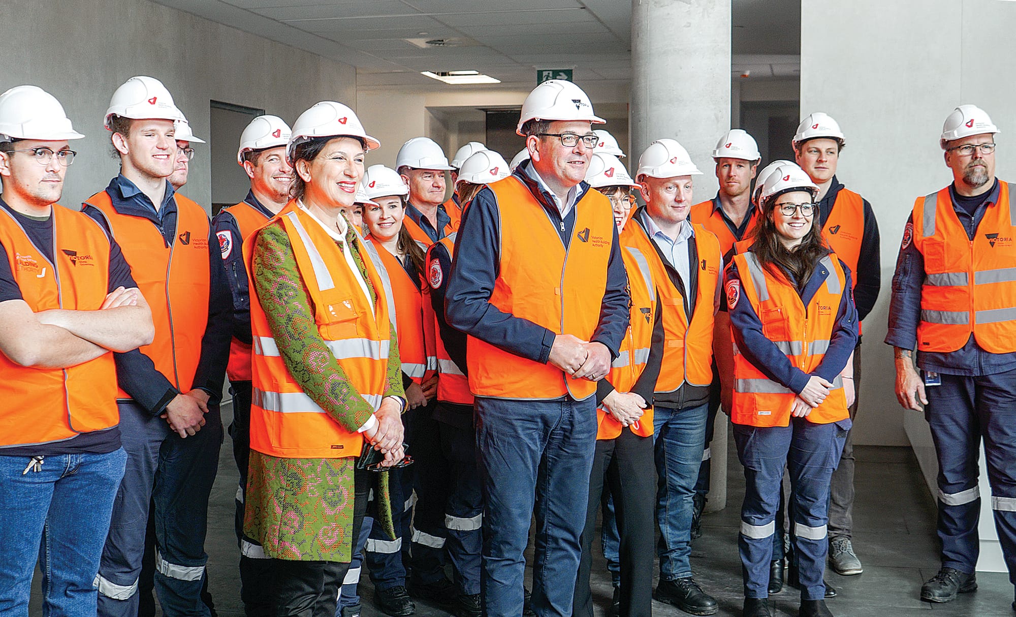 Premier Daniel Andrews with Member for Bass Jordan Crugnale standing with local paramedics before making his jaw-dropping funding announcement. Ns053822