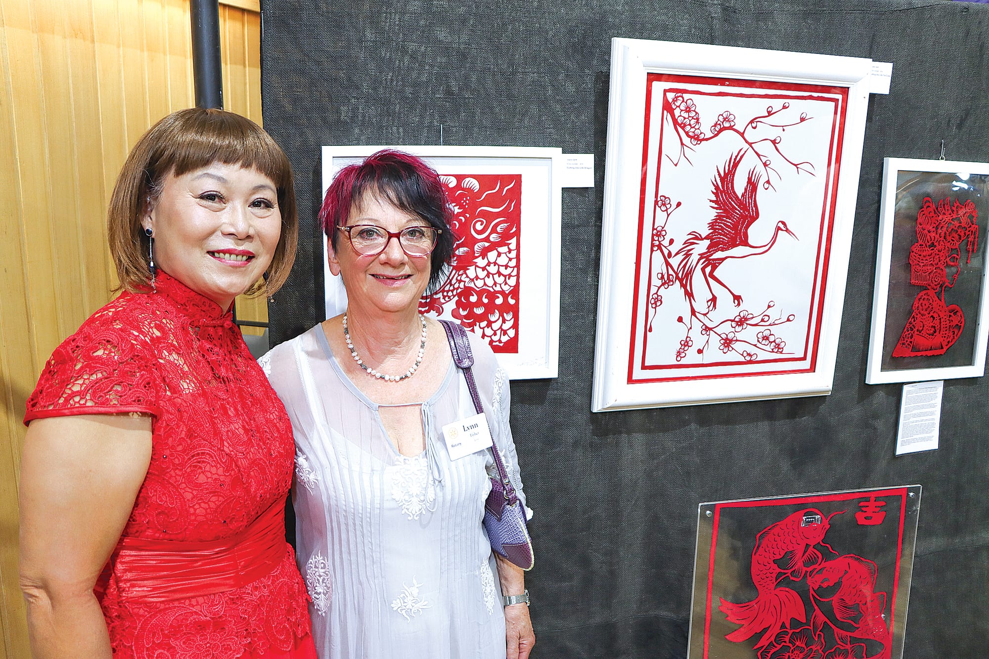 Joann Gan with her artwork and Lynn Fisher who arranged the exhibition with Bob Hickman. A16_0325