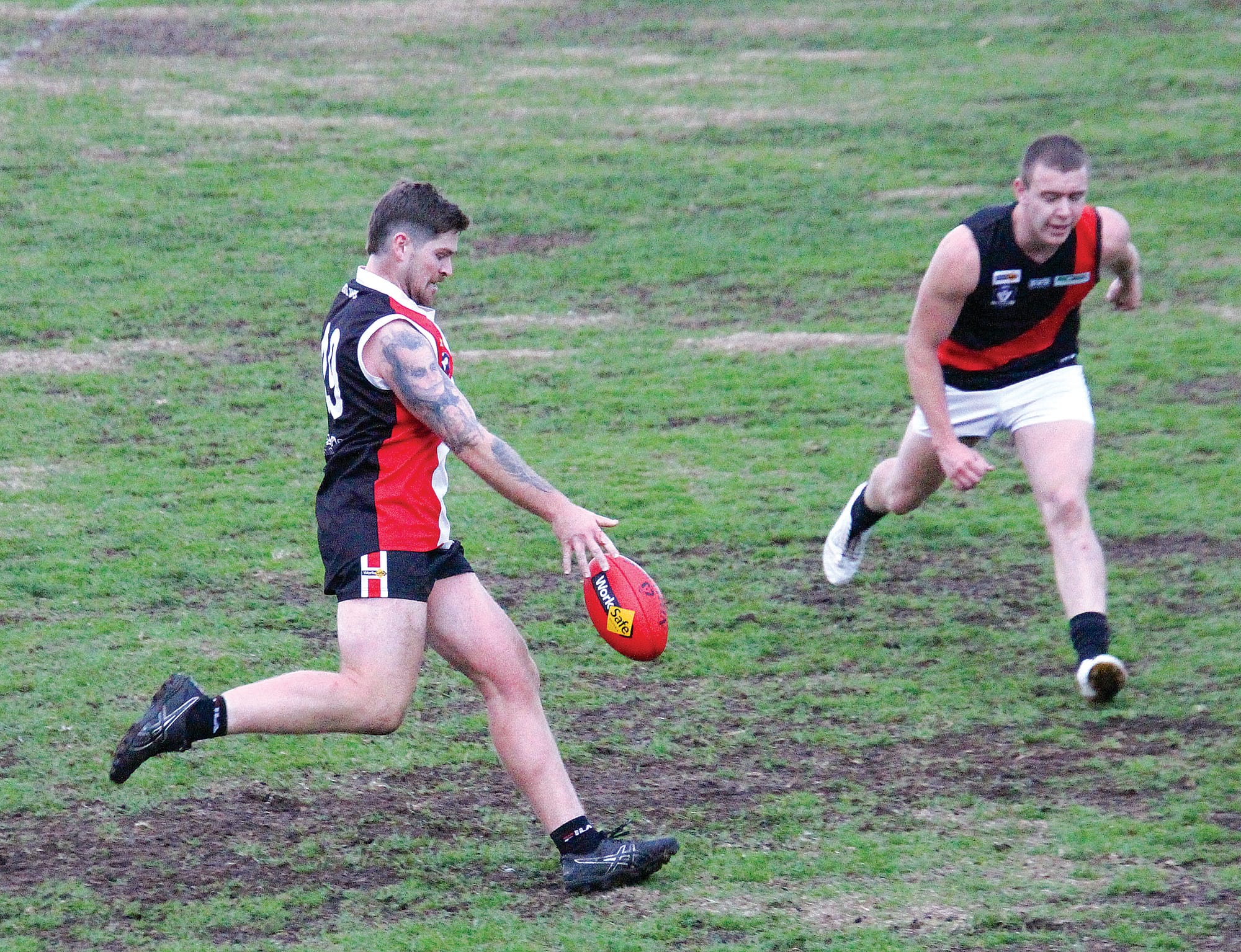 Aaron Coggins send the ball into attack to help seal the win in the last quarter. 