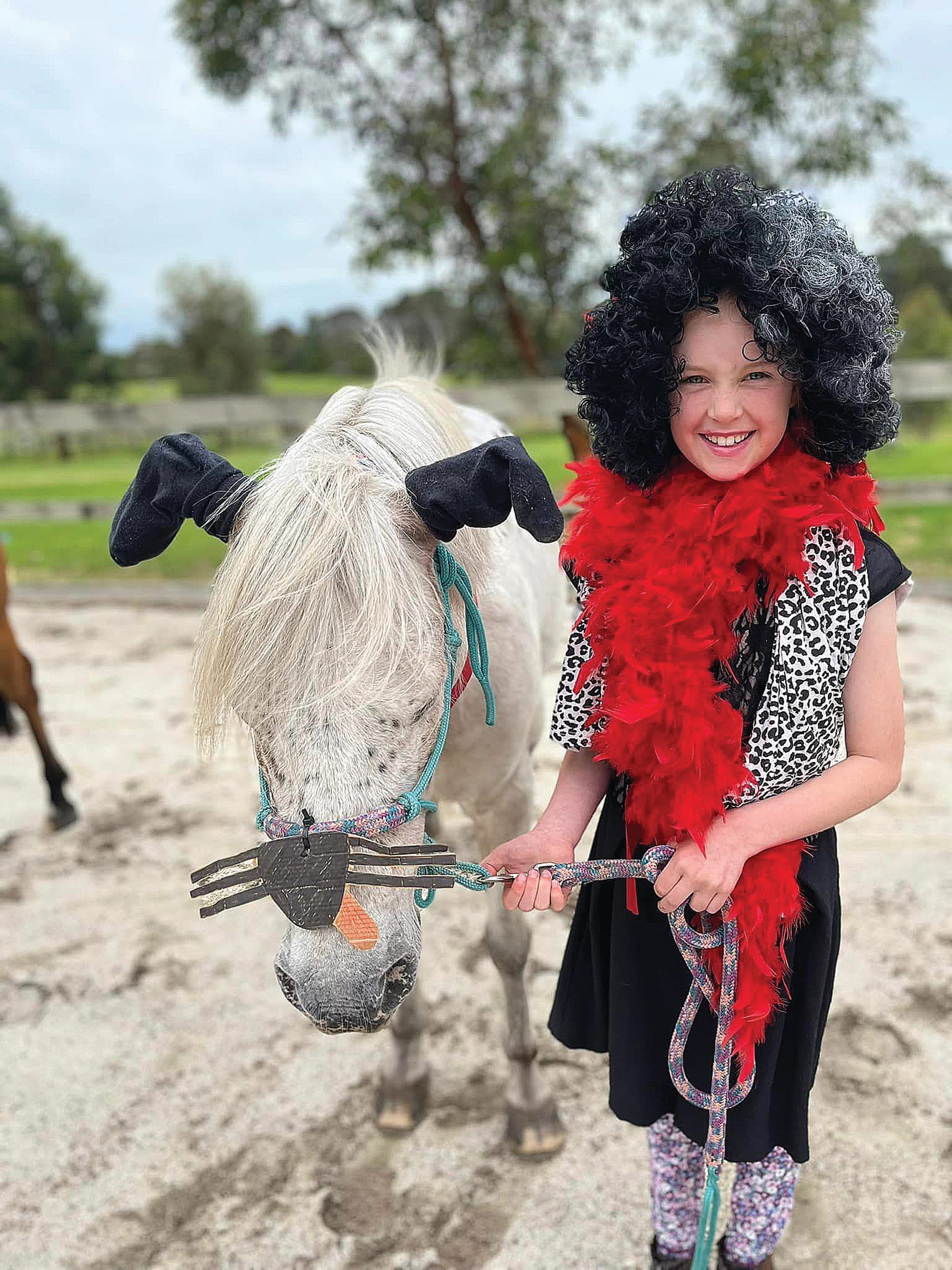 Ellie Wilkinson on Rocko brought her festive costume to the Christmas Rally with Wonthaggi Pony Club.
