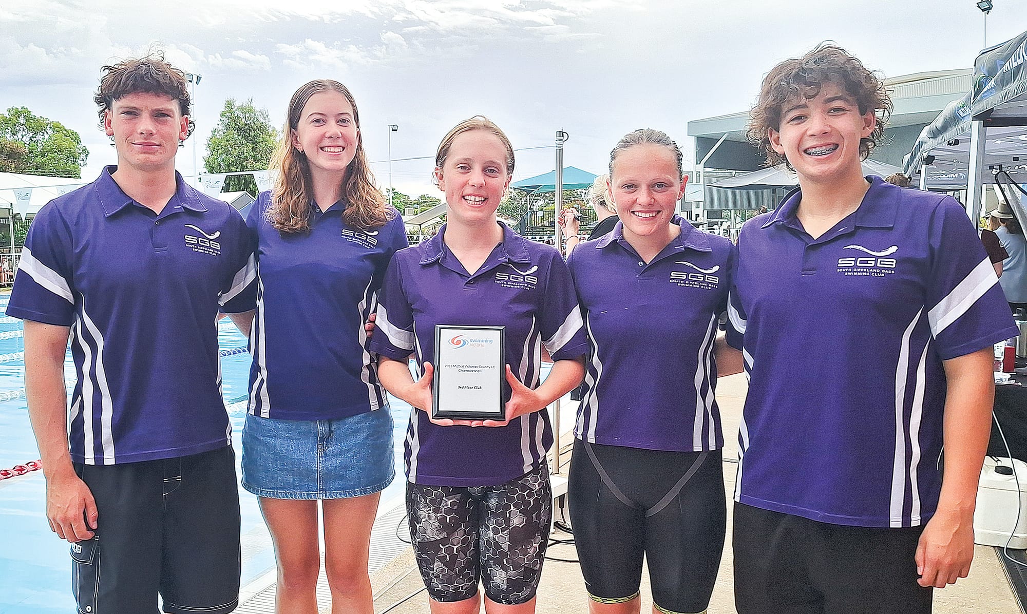 Captains Mostyn, Lara, Trinity, Asha and Hugh were happy to collect the award for third place at the meet.