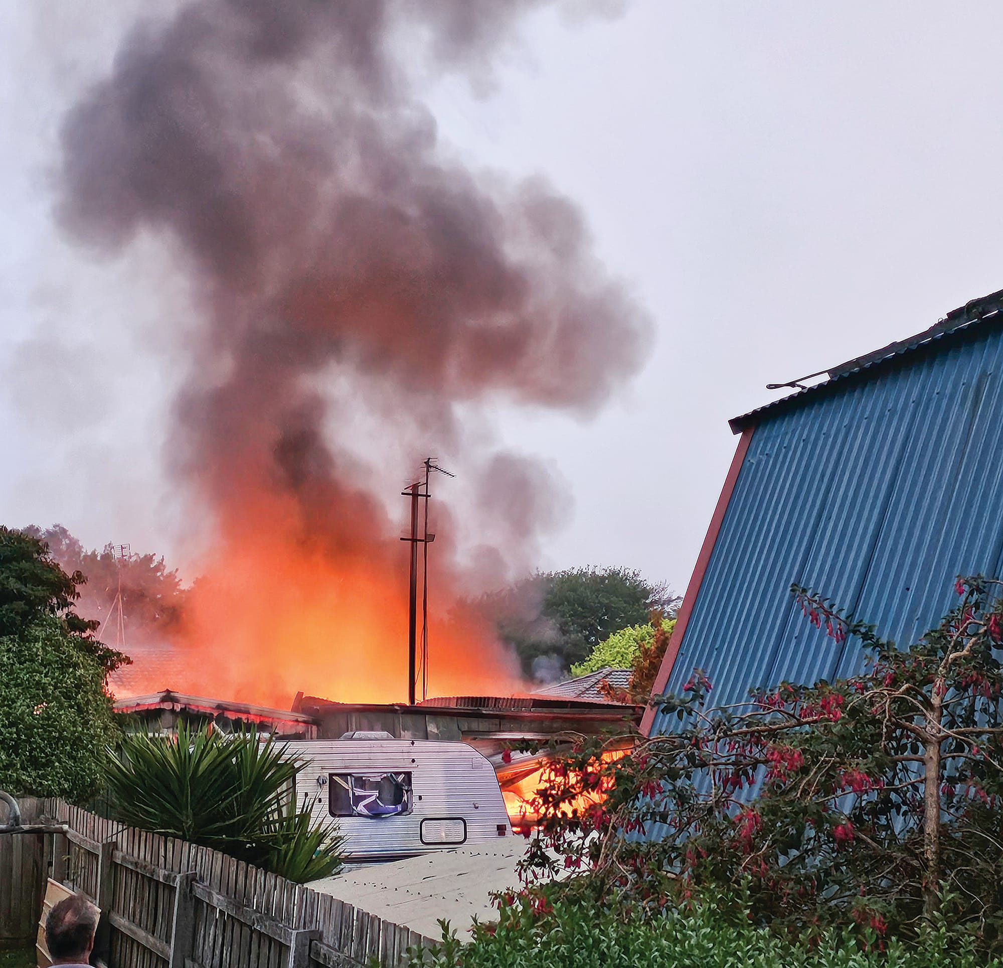 Fire brigades from the local region combined to extinguish this shed fire in Leongatha’s Johnson Street, preventing it from spreading to other buildings.