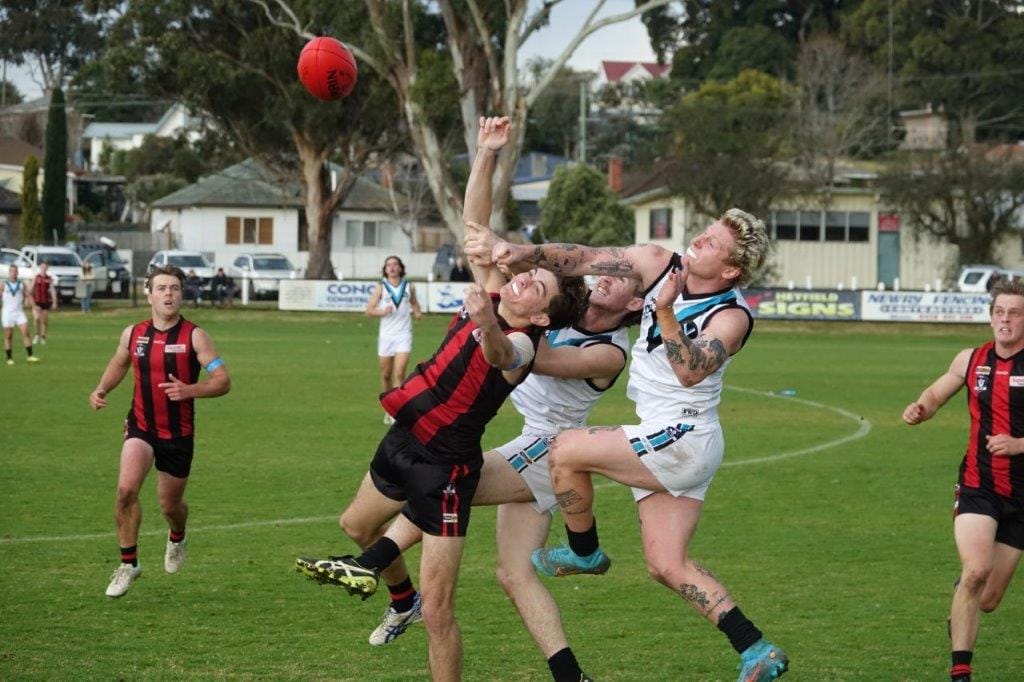 Darcy Brosnan demonstrates the defensive efforts that made the difference for Power in a tough contest at Maffra.