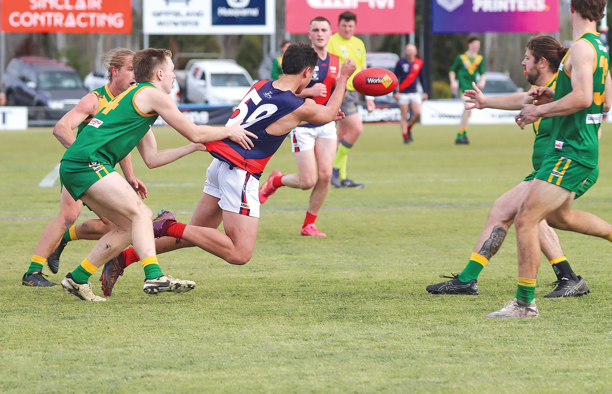 Beau Grabham-Andrews of Leongatha gets hold of Tyson Matthews, one of Bairnsdale’s best in the Reserves Grand Final. A52_3924