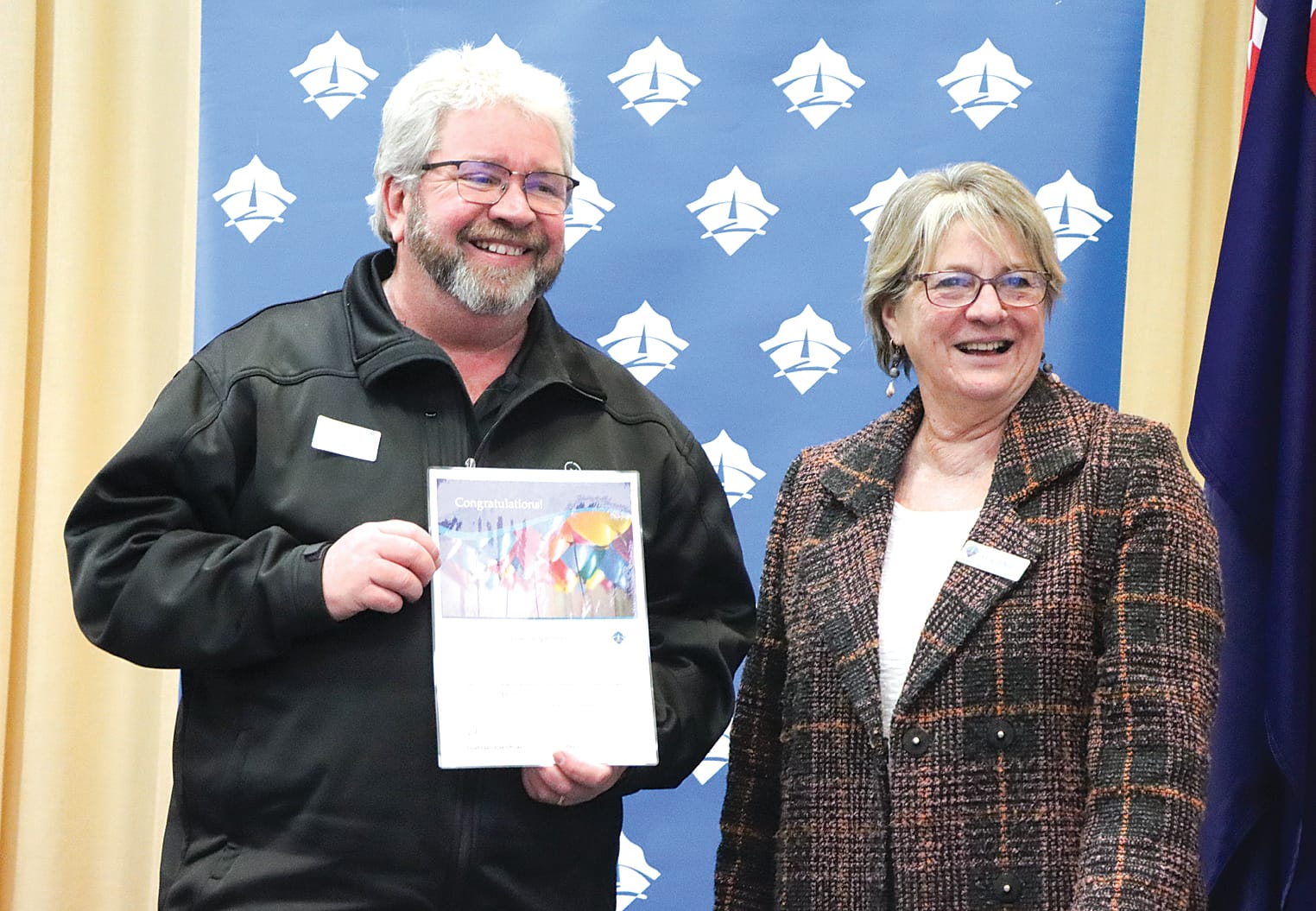 Sean Taylor is delighted with South Gippsland Shire Council’s $7500 contribution towards essential remedial works to Yanakie Hall, with Cr Jenni Keerie. A05_3124