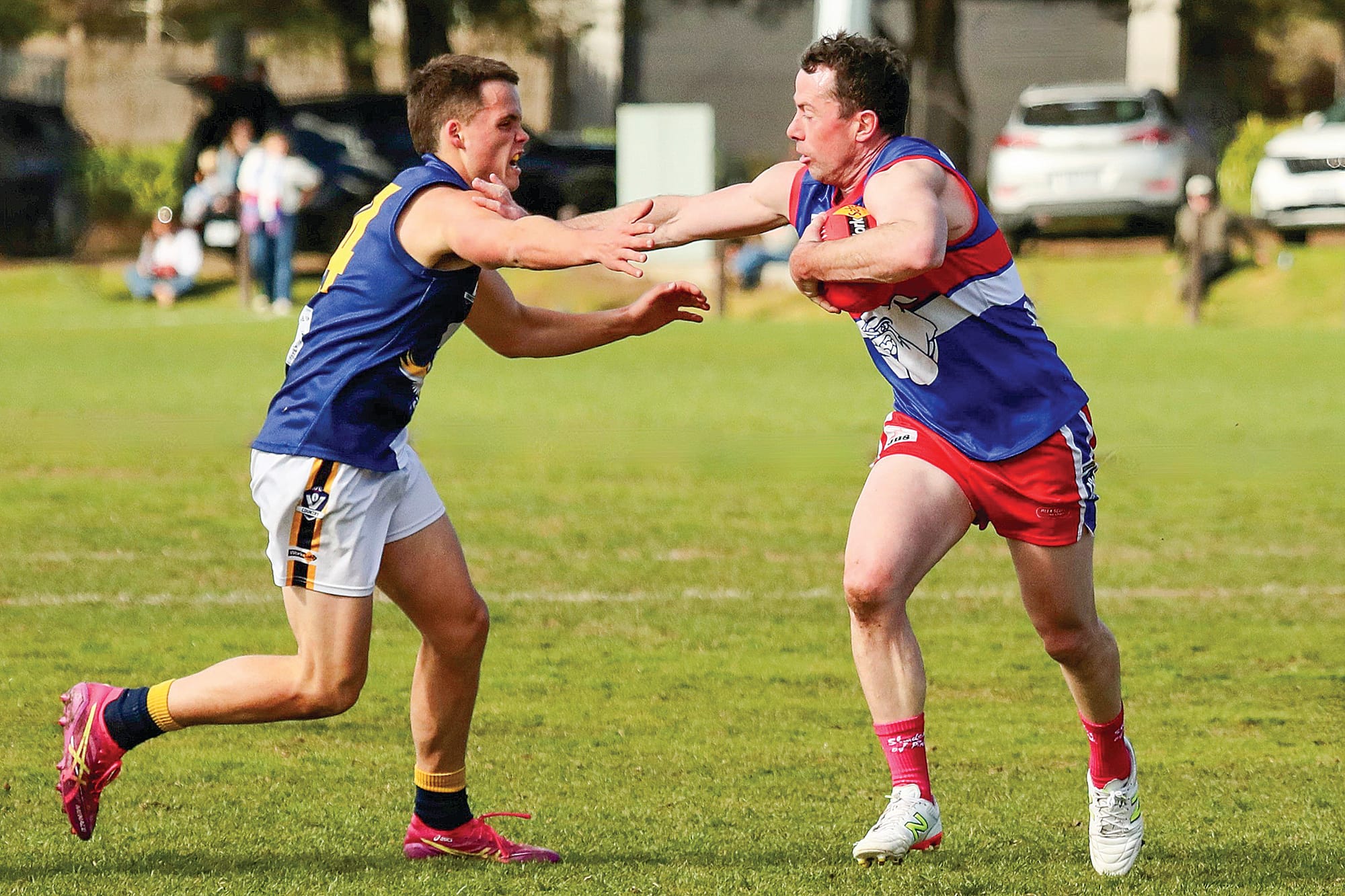Mark Collision holds off his opponent. Photo: Carol Ratcliff. 
