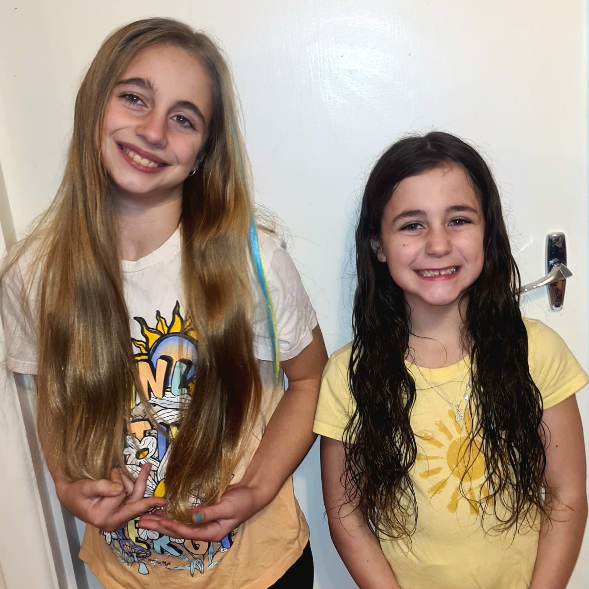 Sisters donate hair in memory of grandmother for cancer fundraiser