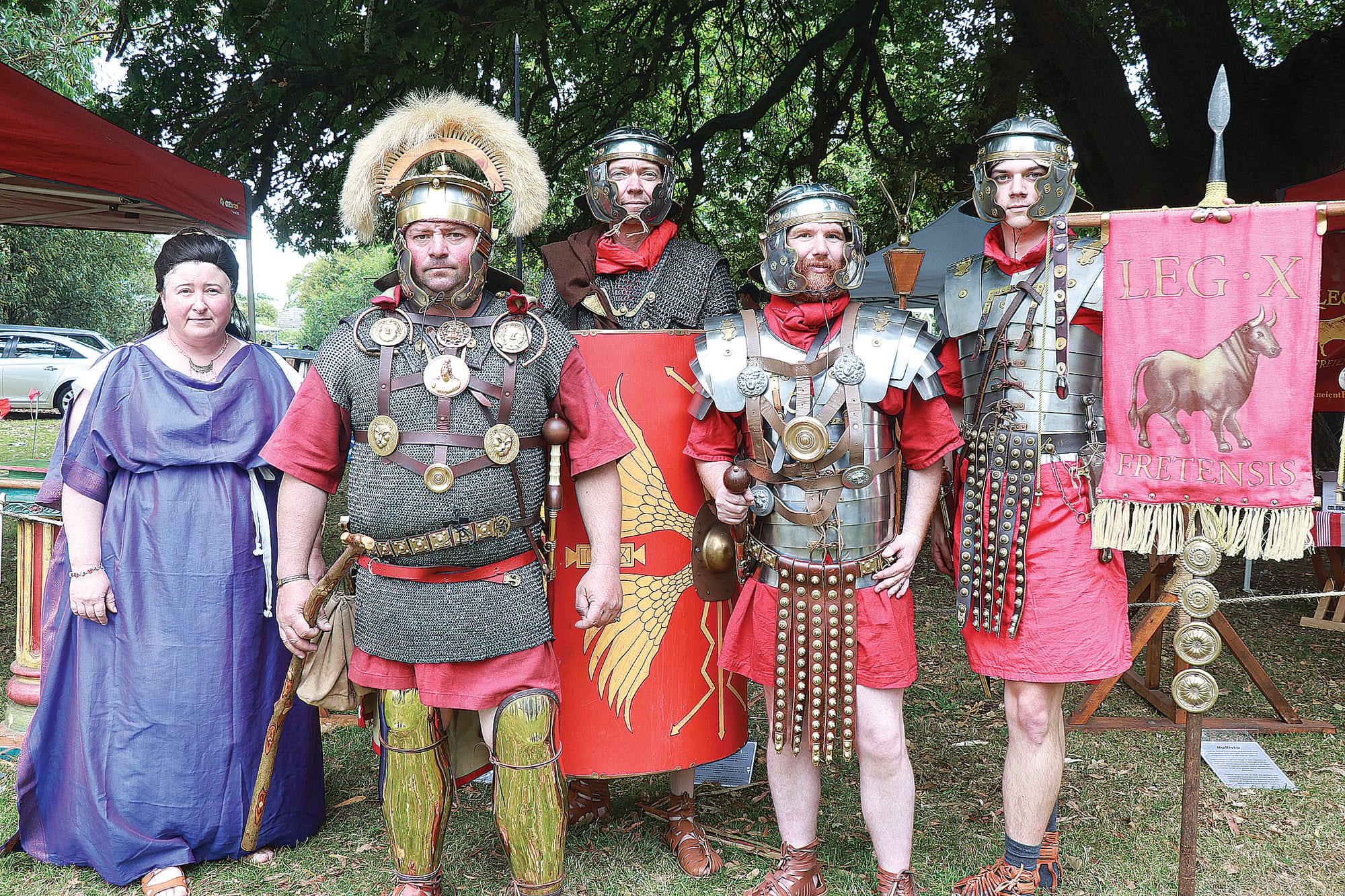Barbara, Robert, John, James, and Jordan of the Ancient Roman Reenactors Victoria are enthusiasts of ancient Roman history, showcasing the tools and culture at the Italian Festa.