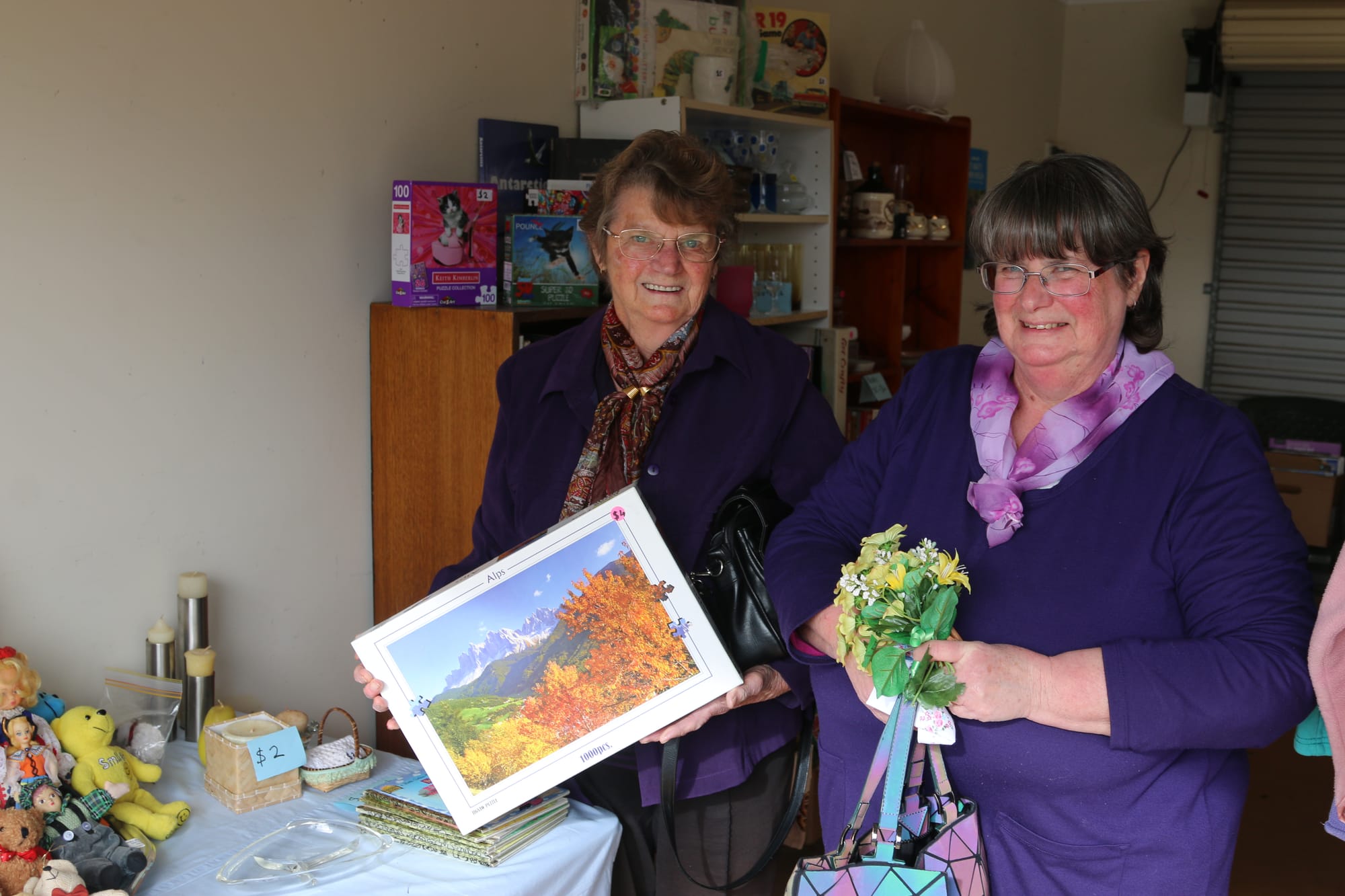 Dulcie Notman and daughter Helen Brereton shop at the charity garage sale. 