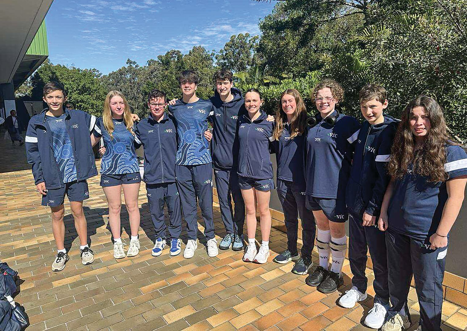 Team vic Gippsland swimmers gather together before racing.