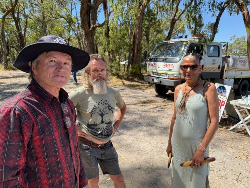 Among those attending the event at the Dunbabbin Road Picnic Area in the Gurdies Nature Conservation Reserve last Saturday were Neil Rankine, local custodian Sonya Weston and Rohan Myers of San Remo.
