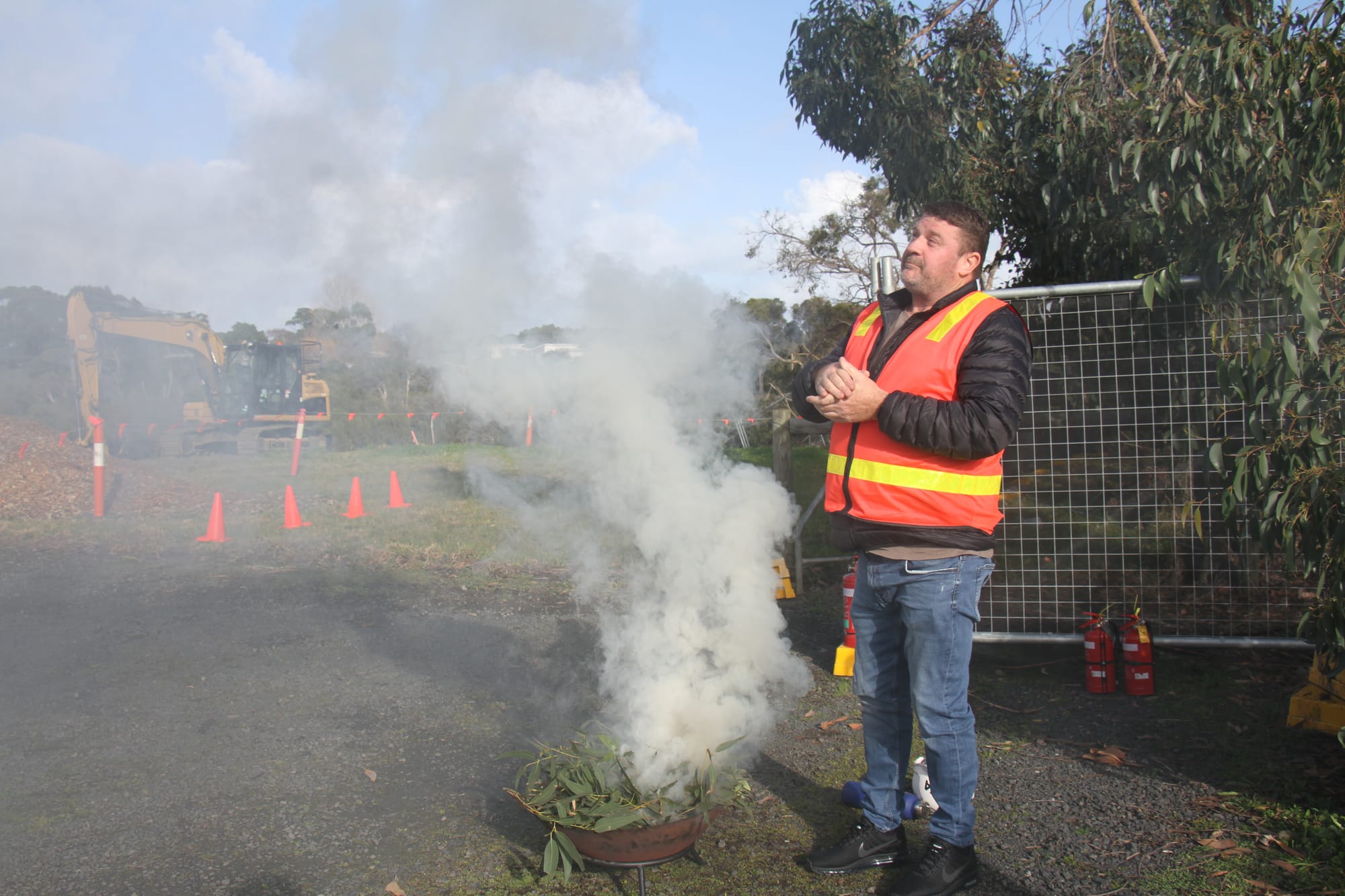 Bunurong Elder Robert Ogden conducting the smoking ceremony to mark the start of construction of new hotel-style accommodation for health workers and their families at Wonthaggi Hospital. B07_3225