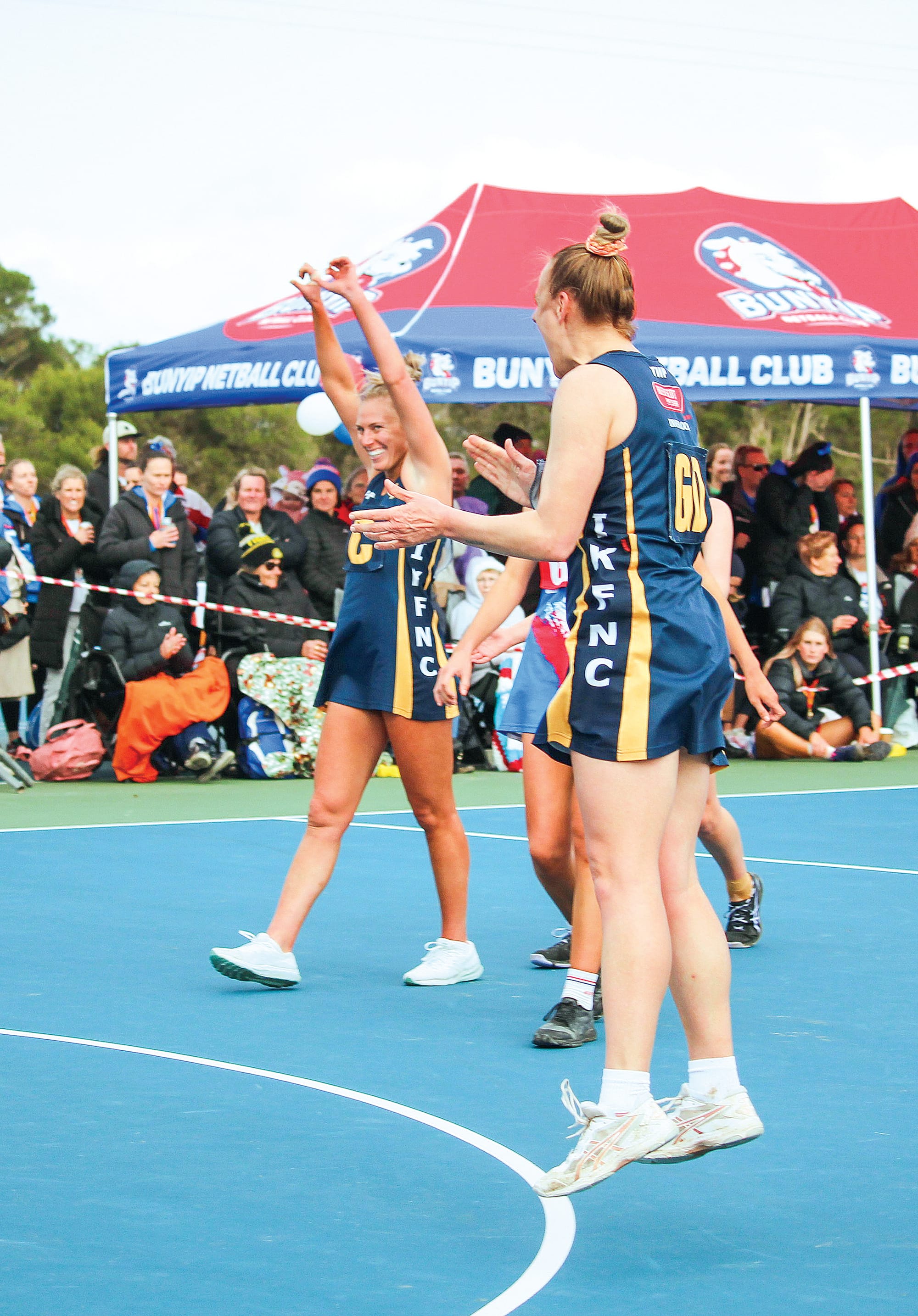 Sea Eagles Kelsey Buxton and Renee Pilkington celebrate the premiership as the final siren sounds.