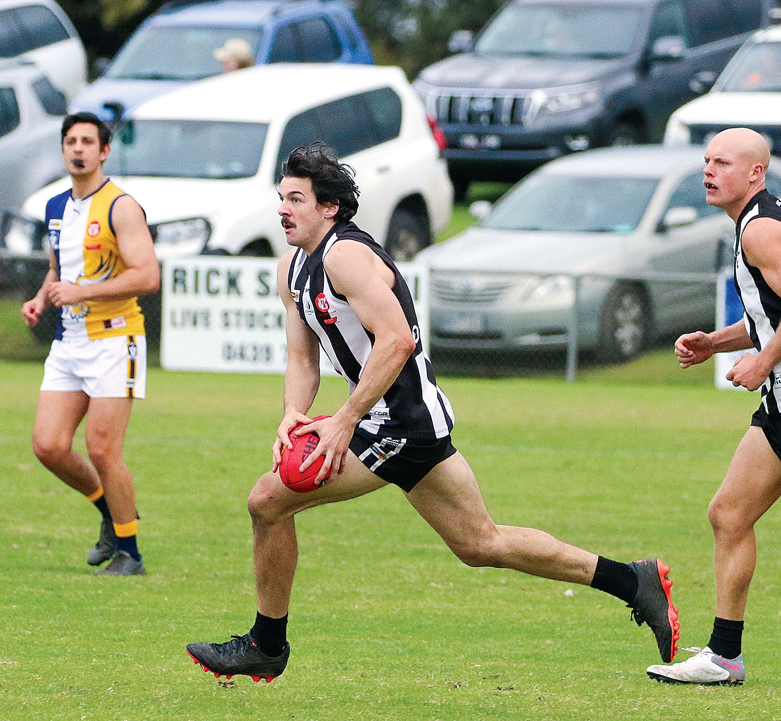 Michael Marotta takes off with the ball down the field. ob28_2123