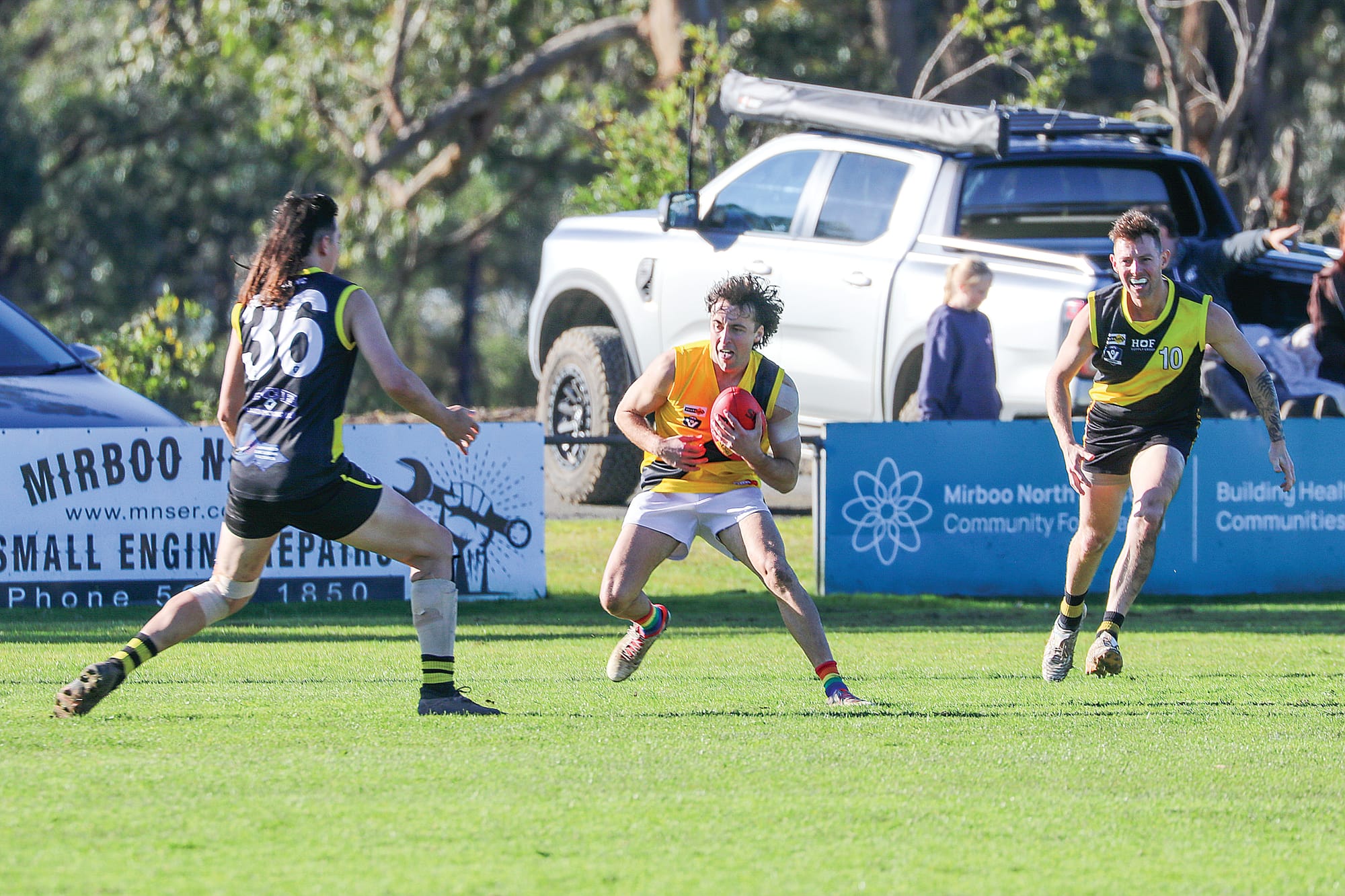 Foster big man Mitchell Allott uses his frame to get an advantage in the ruck contest. 