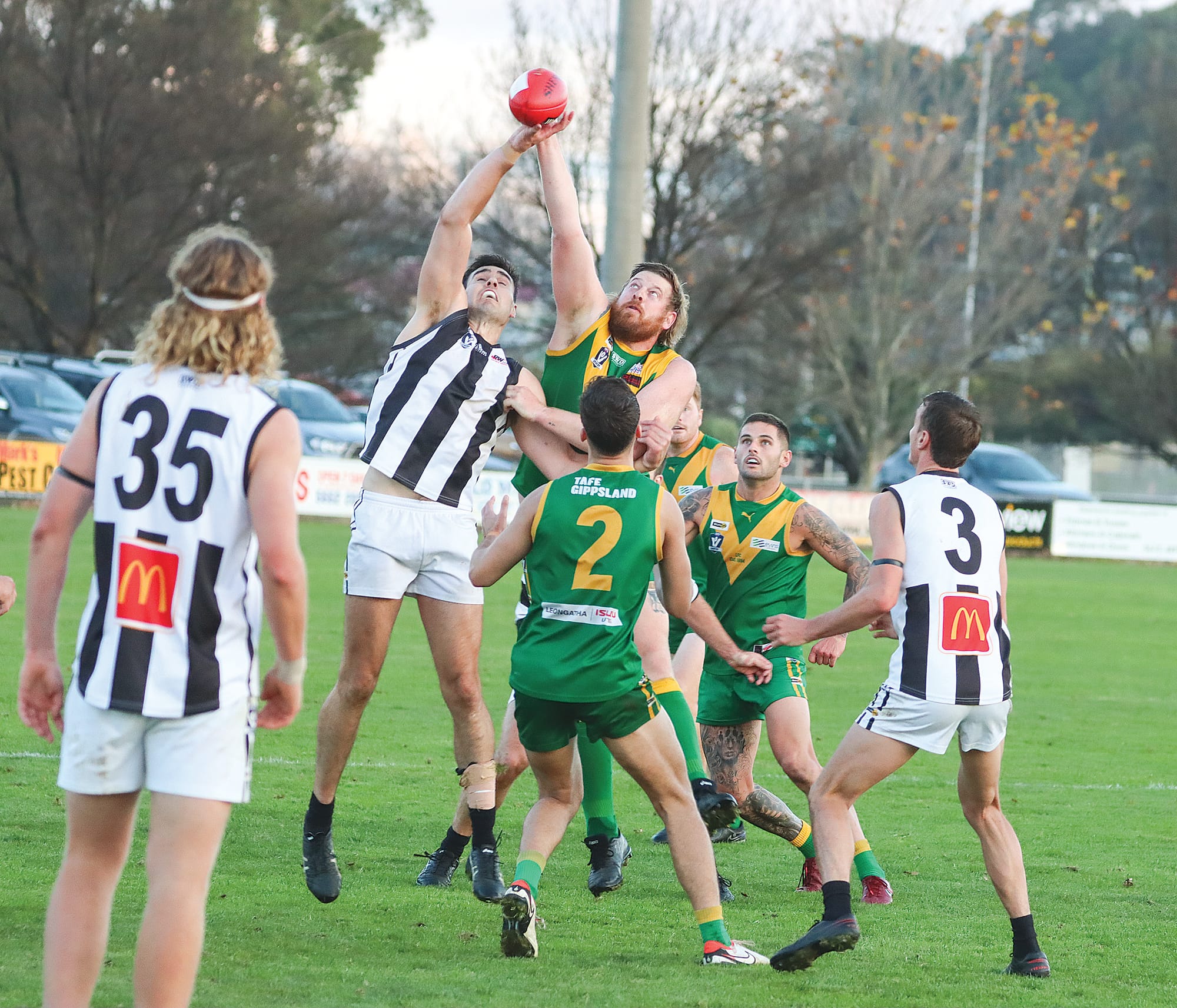 Leongatha and Sale compete in the ruck during the Parrots’ win on Saturday.