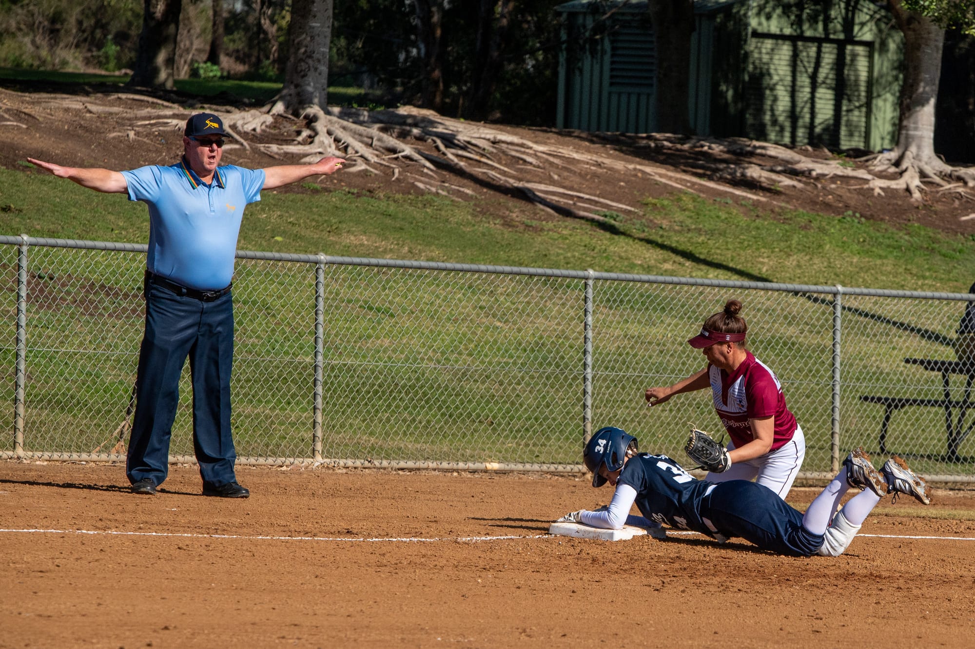 Melony Grand-Court, Softball Victoria representative, diving safe at Nationals. 