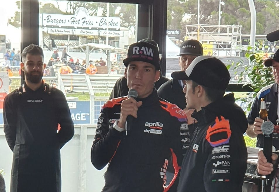 Aprilia riders Aleix Espargaró and Maverick Viñales speak at one of the corporate reception venues on final qualifying day at Phillip Island on Saturday.