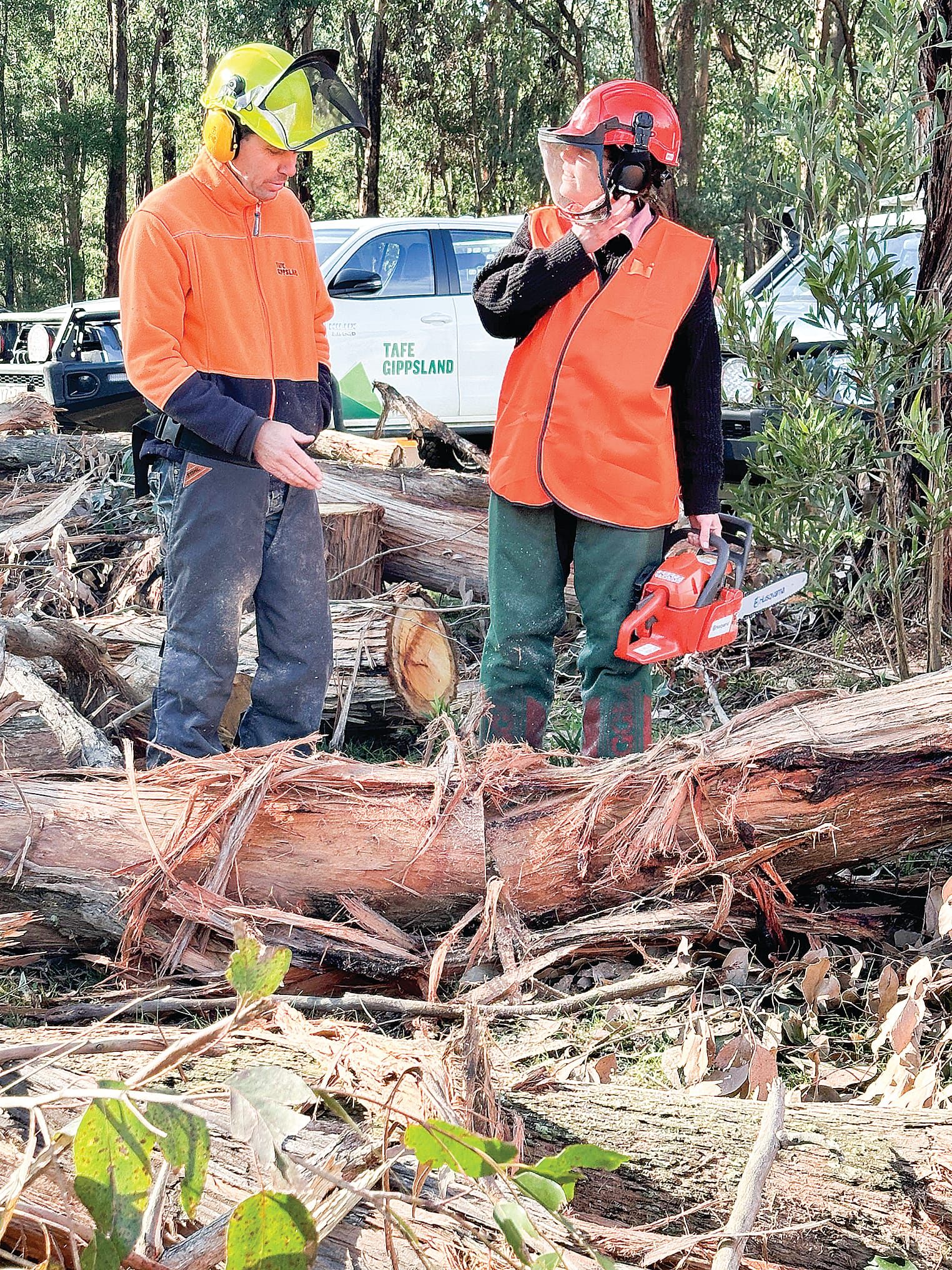 TAFE Gippsland forestry educator Russell Barter with participant Sharni Norton.