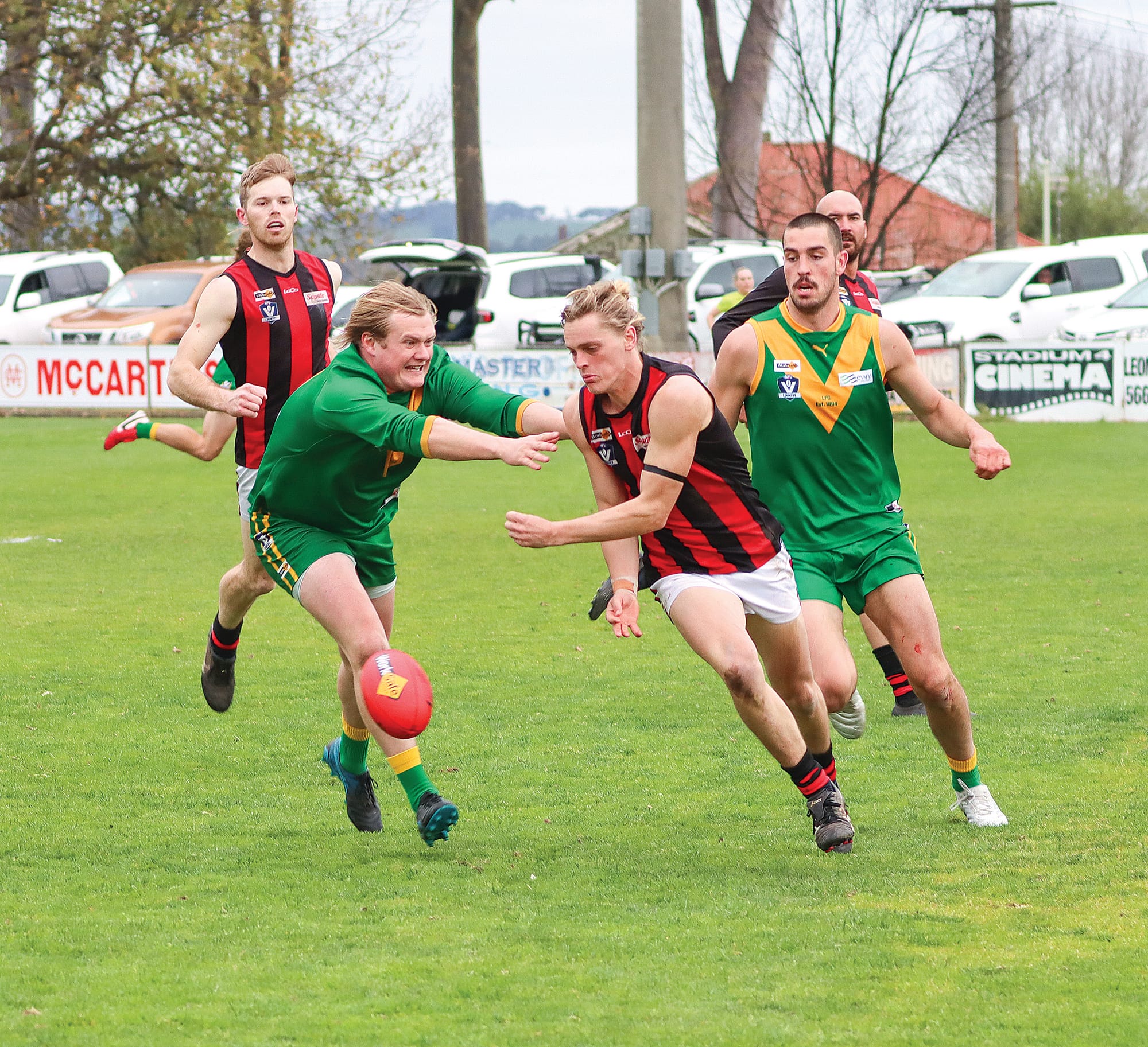 Leongatha’s Jack Ginnane bears down on his Maffra opponent during the Parrots’ comfortable victory. A40_3523